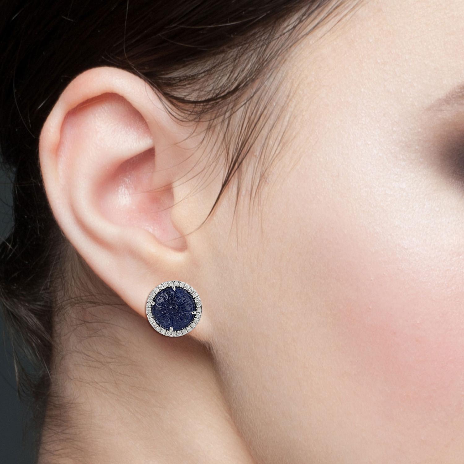 These stunning hand carved earrings are thoughtfully and meticulously crafted in 18-karat gold. It is set in 11.16 carats blue sapphire and .58 carats of sparkling diamonds.

FOLLOW  MEGHNA JEWELS storefront to view the latest collection & exclusive