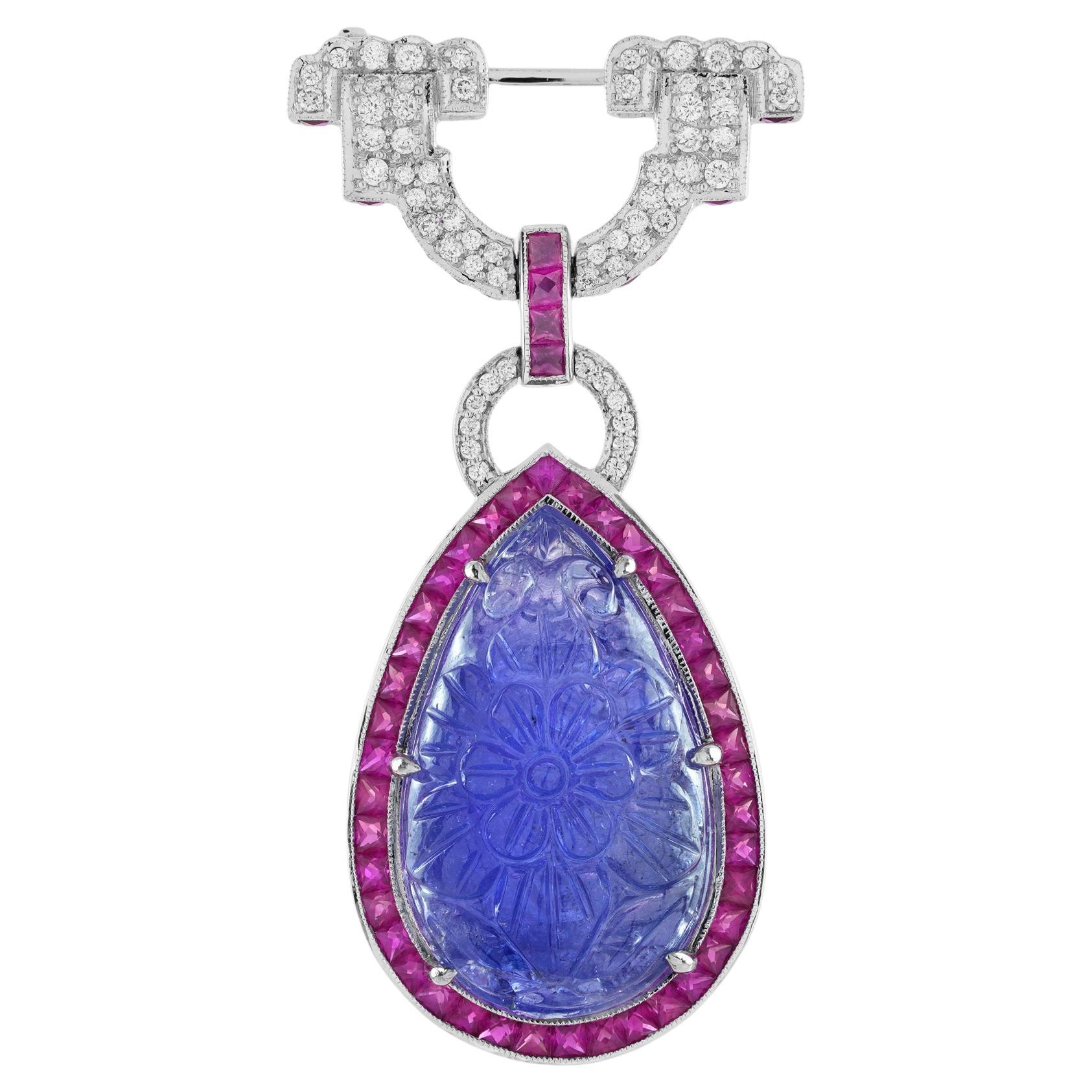 Broche en or blanc de style Art Deco - Tanzanite bleue sculptée et diamant rubis
