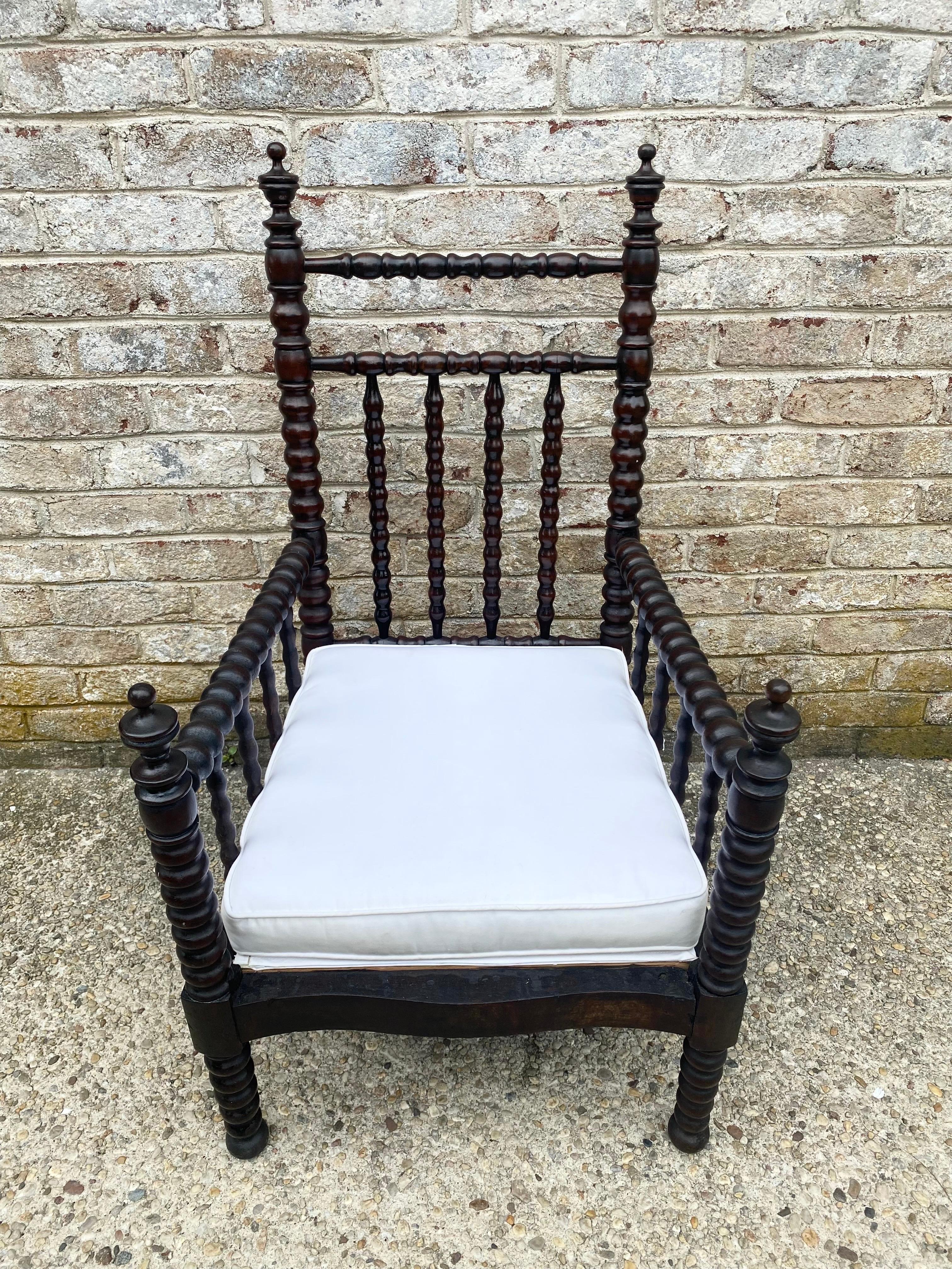 Antique bobbin/turned wood armchair.
Dimensions are as follows: 
Height 40