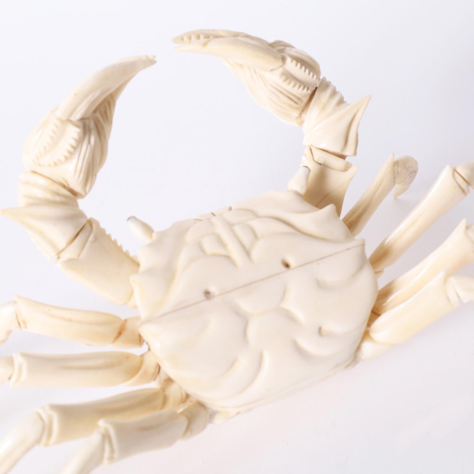 Remarkable crab sculpture crafted in carved bone with surprising accuracy and lots of moving parts.
