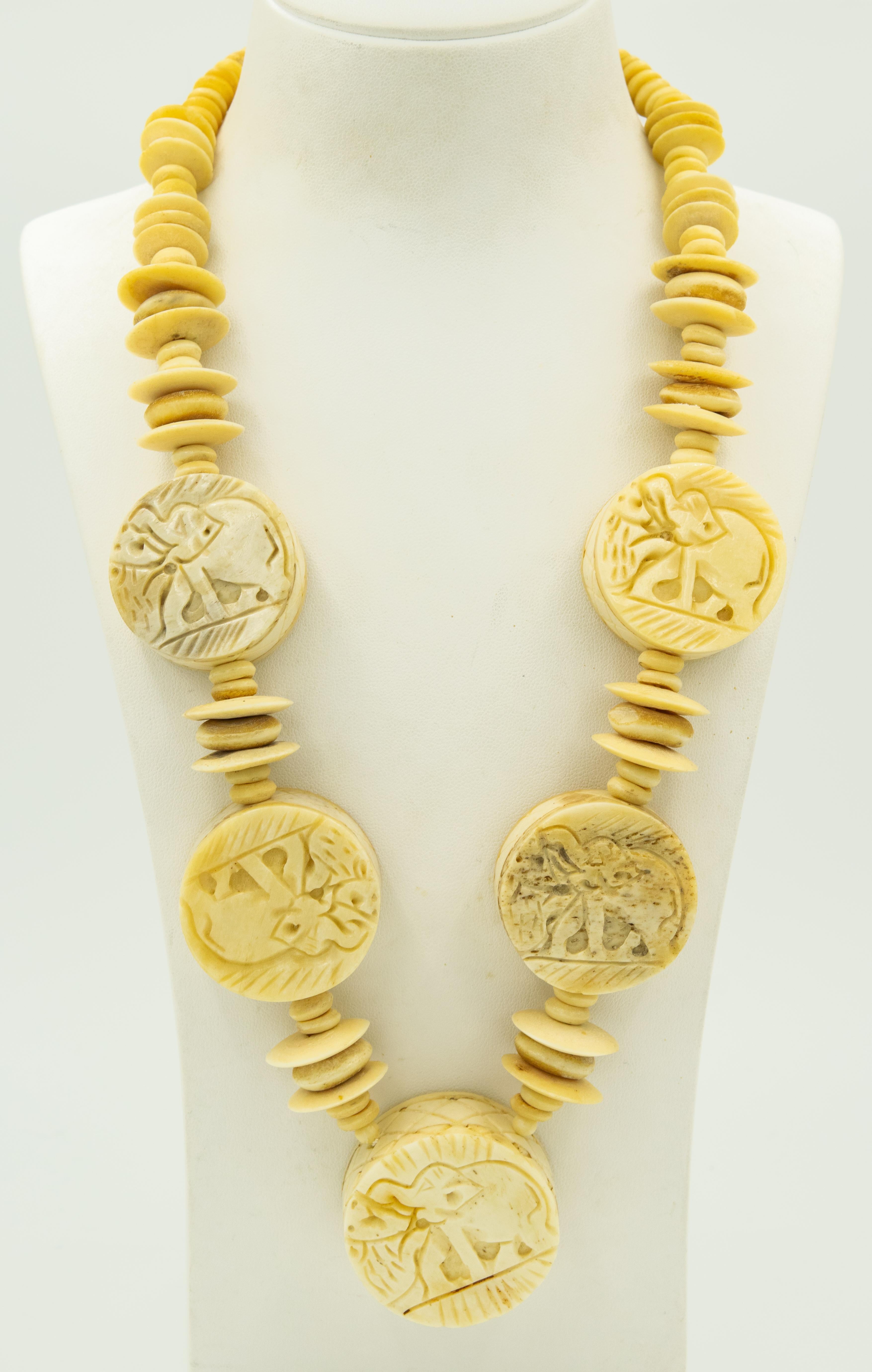 Carved Bone Elephant Necklace and Elephant and Lion Bone Bangle Bracelet Set In Good Condition For Sale In Miami Beach, FL
