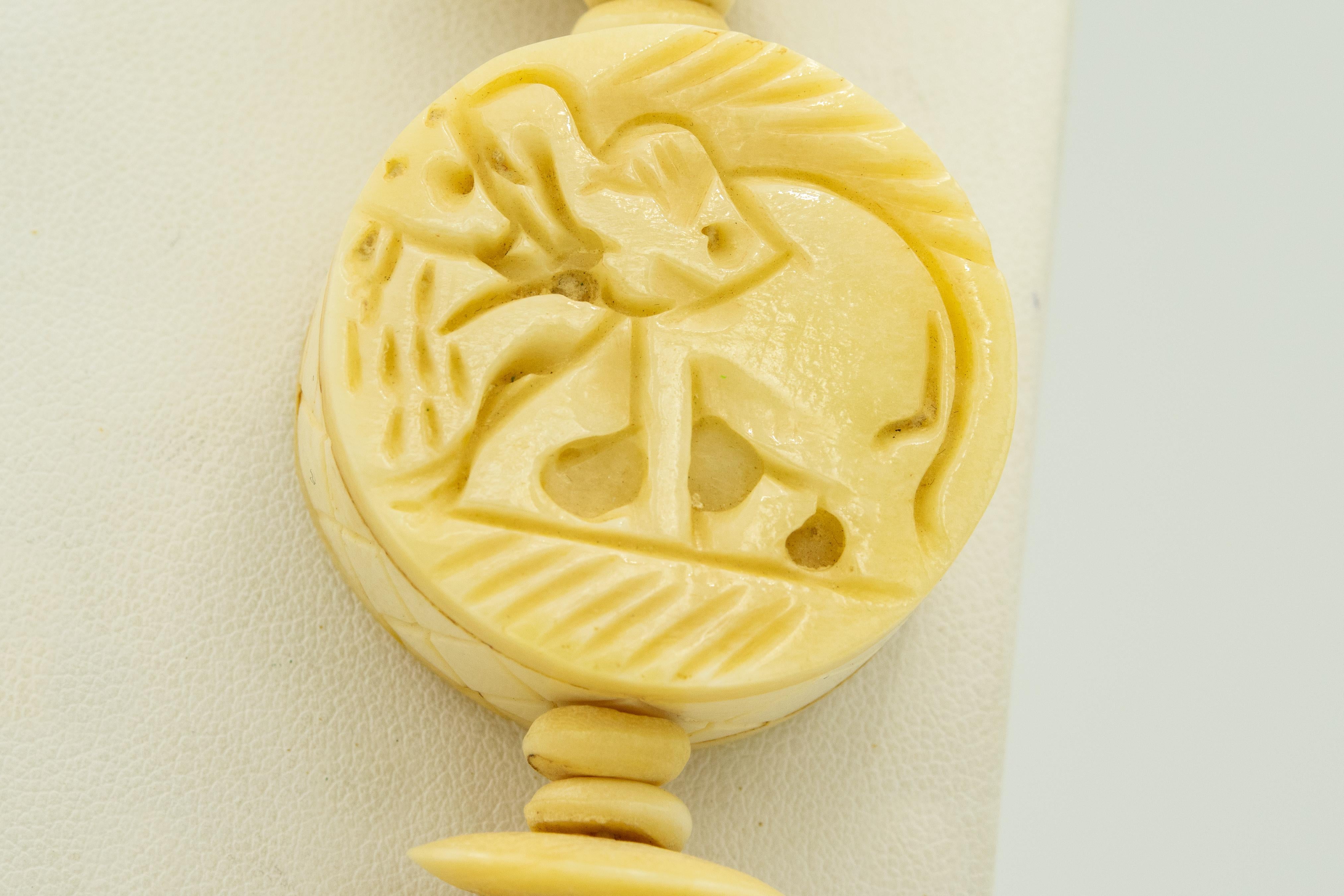 Women's or Men's Carved Bone Elephant Necklace and Elephant and Lion Bone Bangle Bracelet Set For Sale