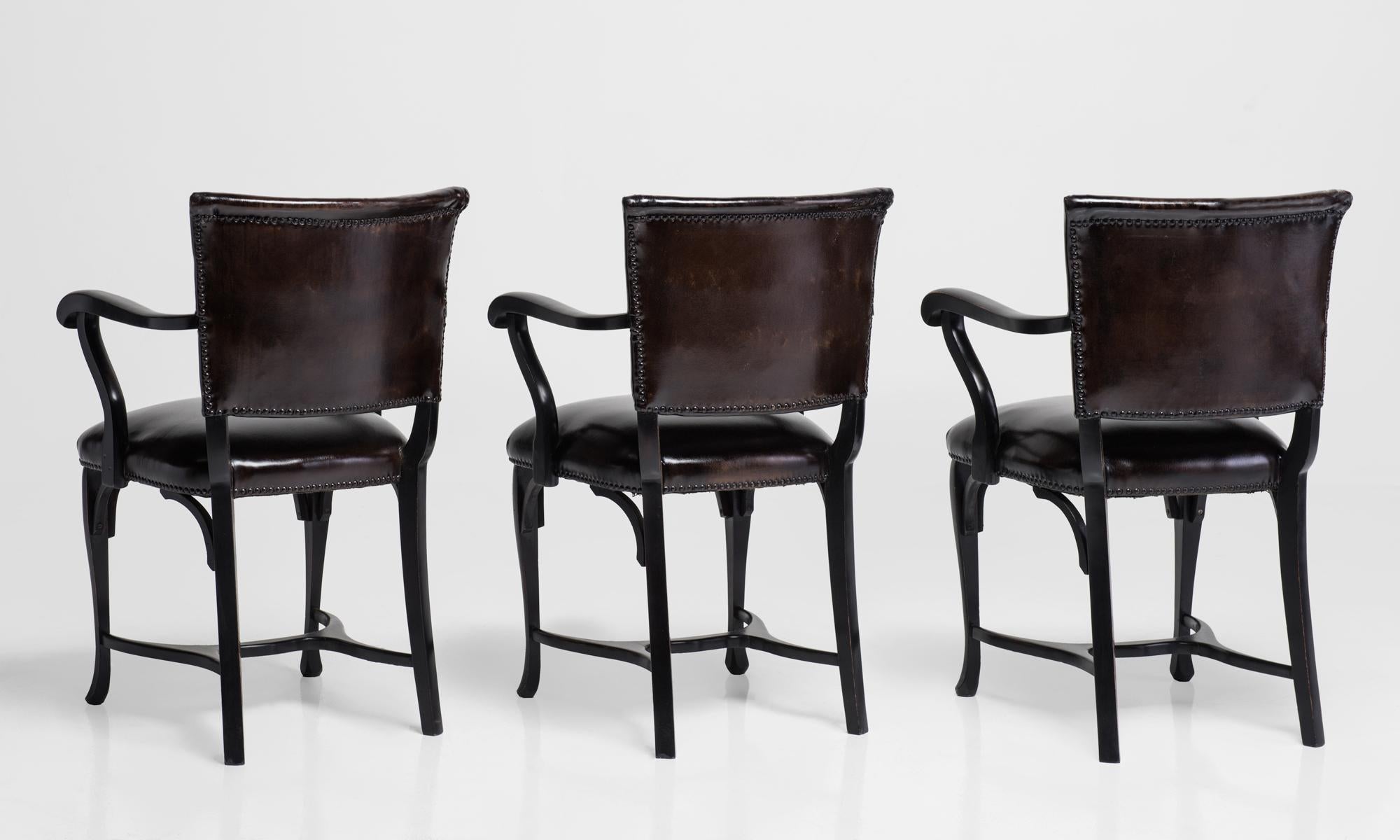 Carved brown leather dining chairs, England, circa 1900.

Attractive ebonized wooden frame, newly reupholstered in leather.

(4 available).

 