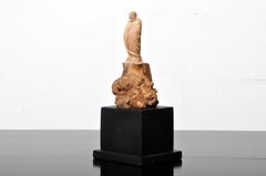 Carved Buddha on a Stand