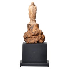 Carved Buddha on a Stand