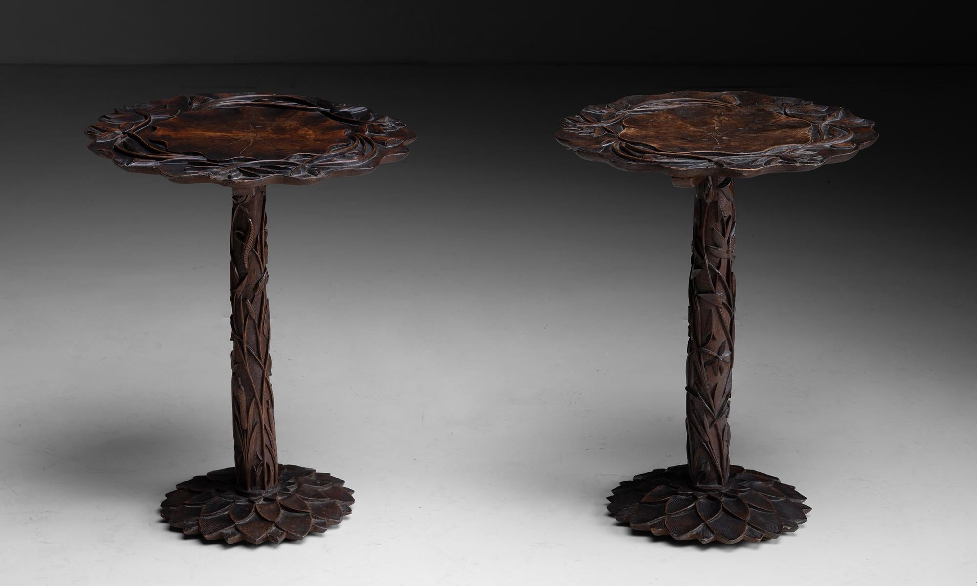 Carved Burmese Side Table

Asia circa 1910

Elegant side table with carved petals, flowers and foliage.

Measures 16.5”dia x 21.5”h

