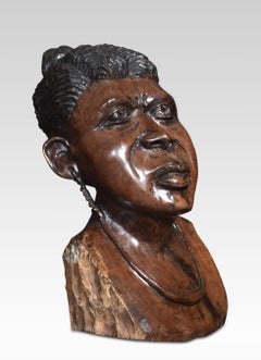 Carved bust of a tribeswoman