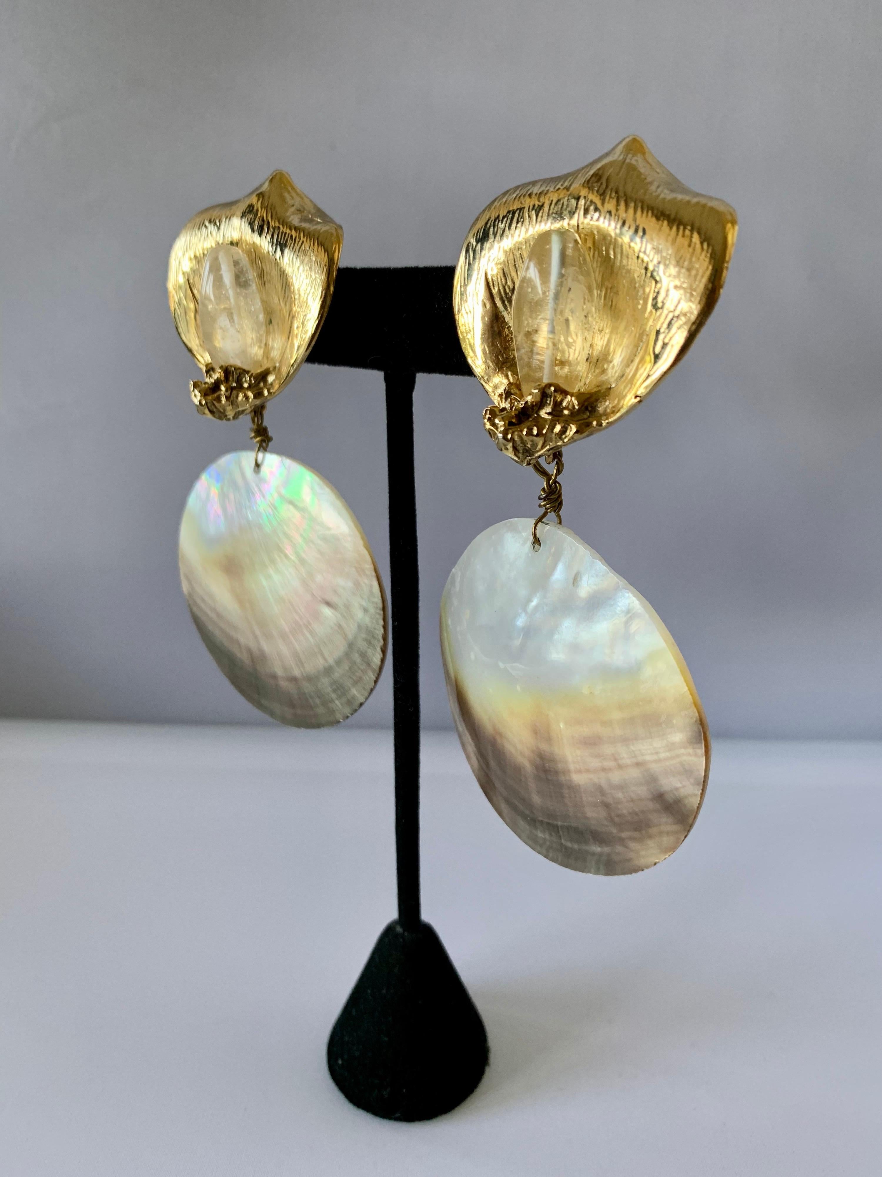 Spectacular artisan large French statement clip-on earrings featuring large bronze gilded calla lily's which are accented by polished rock crystal elements and seashells. 

note: The earrings are lightweight and comfortable to wear.