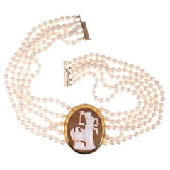 Collier pendentif multibrins en or jaune avec perles de culture sculptées