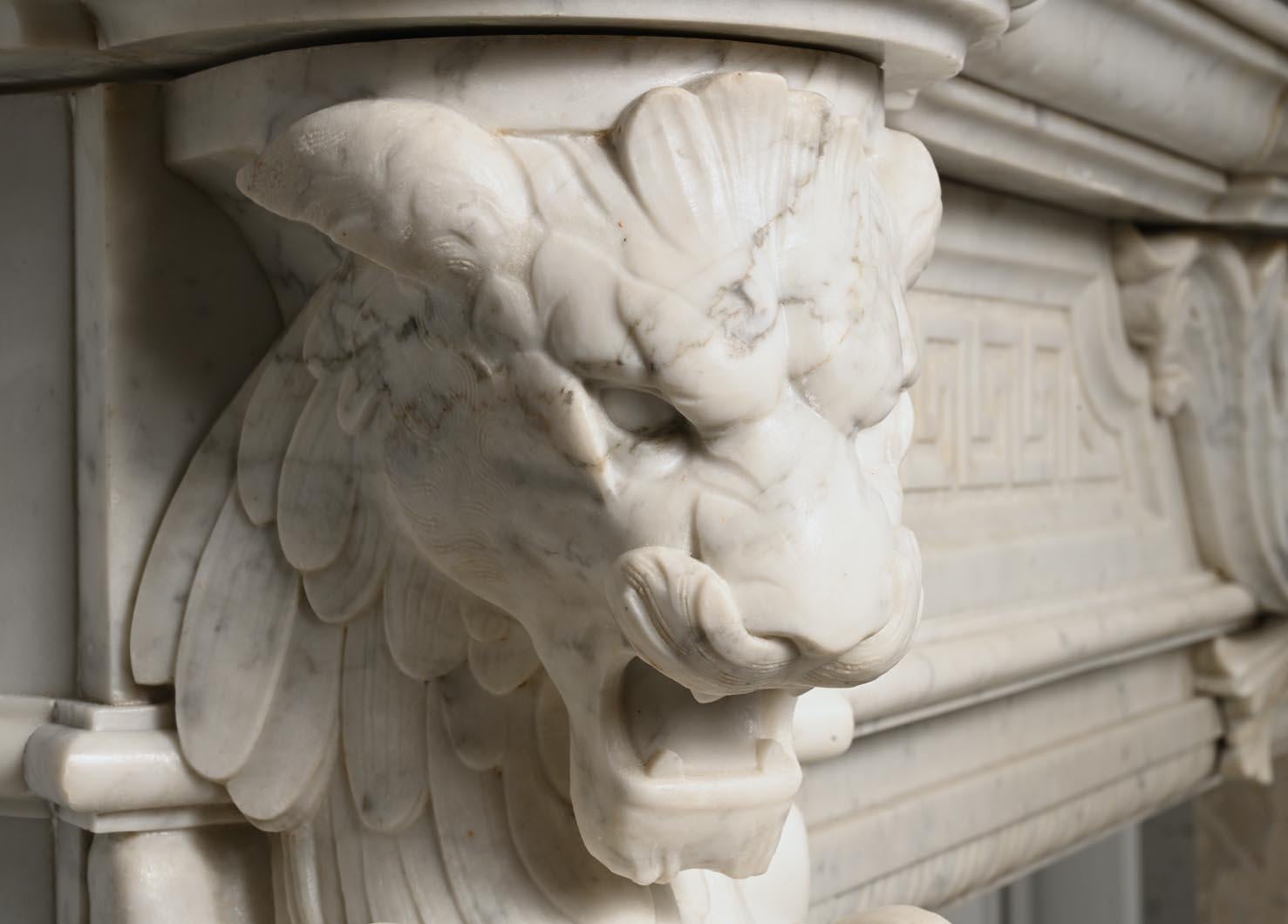 Carved Carrara marble mantel in the Napoleon III style with winged lions In Good Condition For Sale In SAINT-OUEN-SUR-SEINE, FR