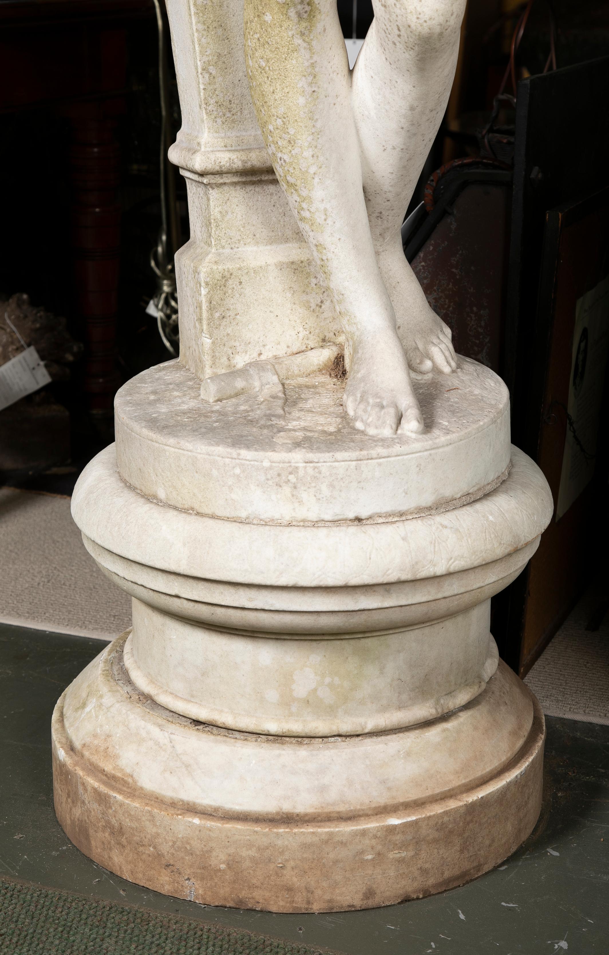 Carved Carrara marble statue of a satyr & maiden on marble plinth from a Black Rock, CT estate on the water. Italian.