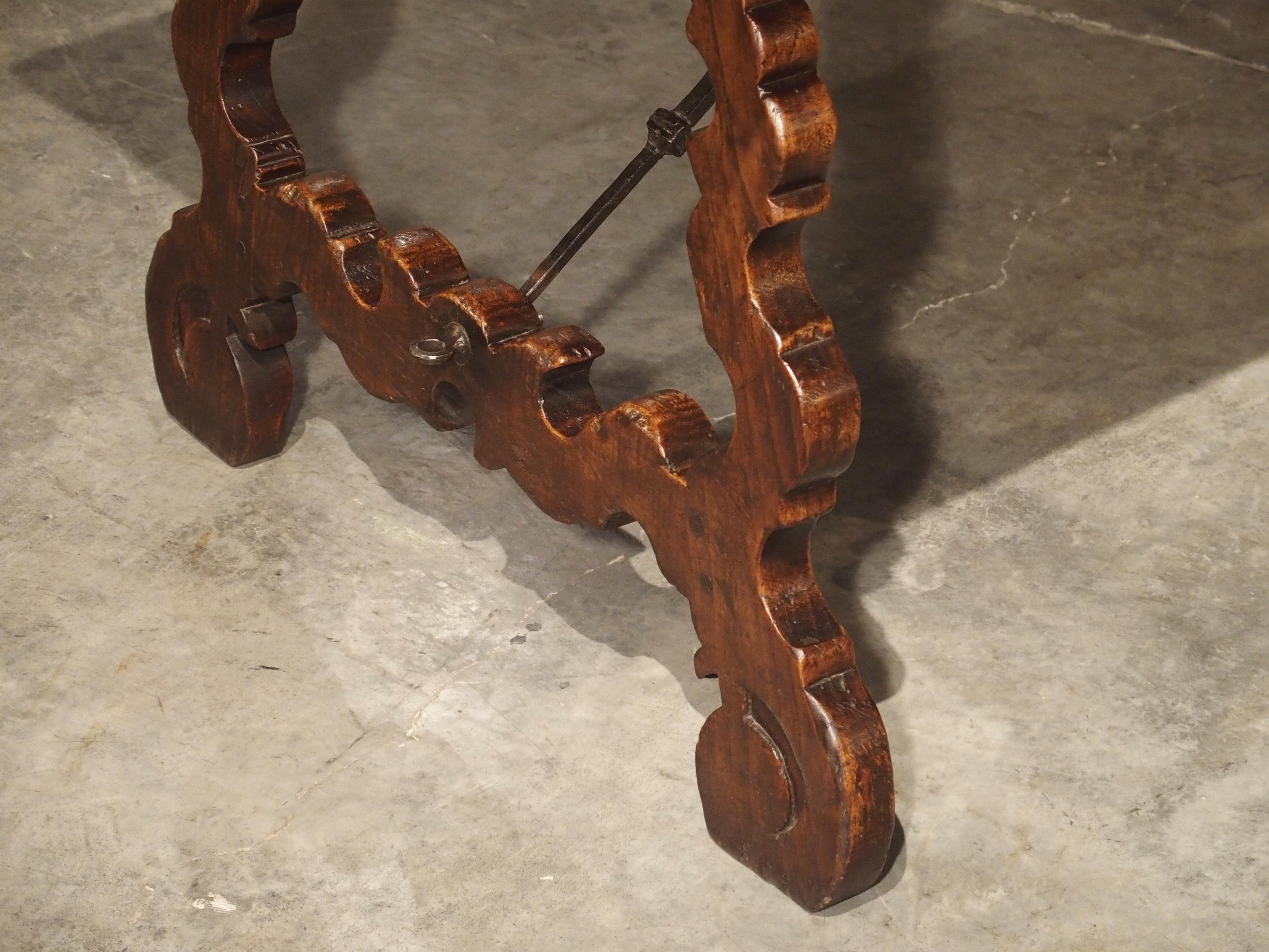 Carved Catalan Table with Lyre Legs and Wrought Iron Supports In Good Condition In Dallas, TX
