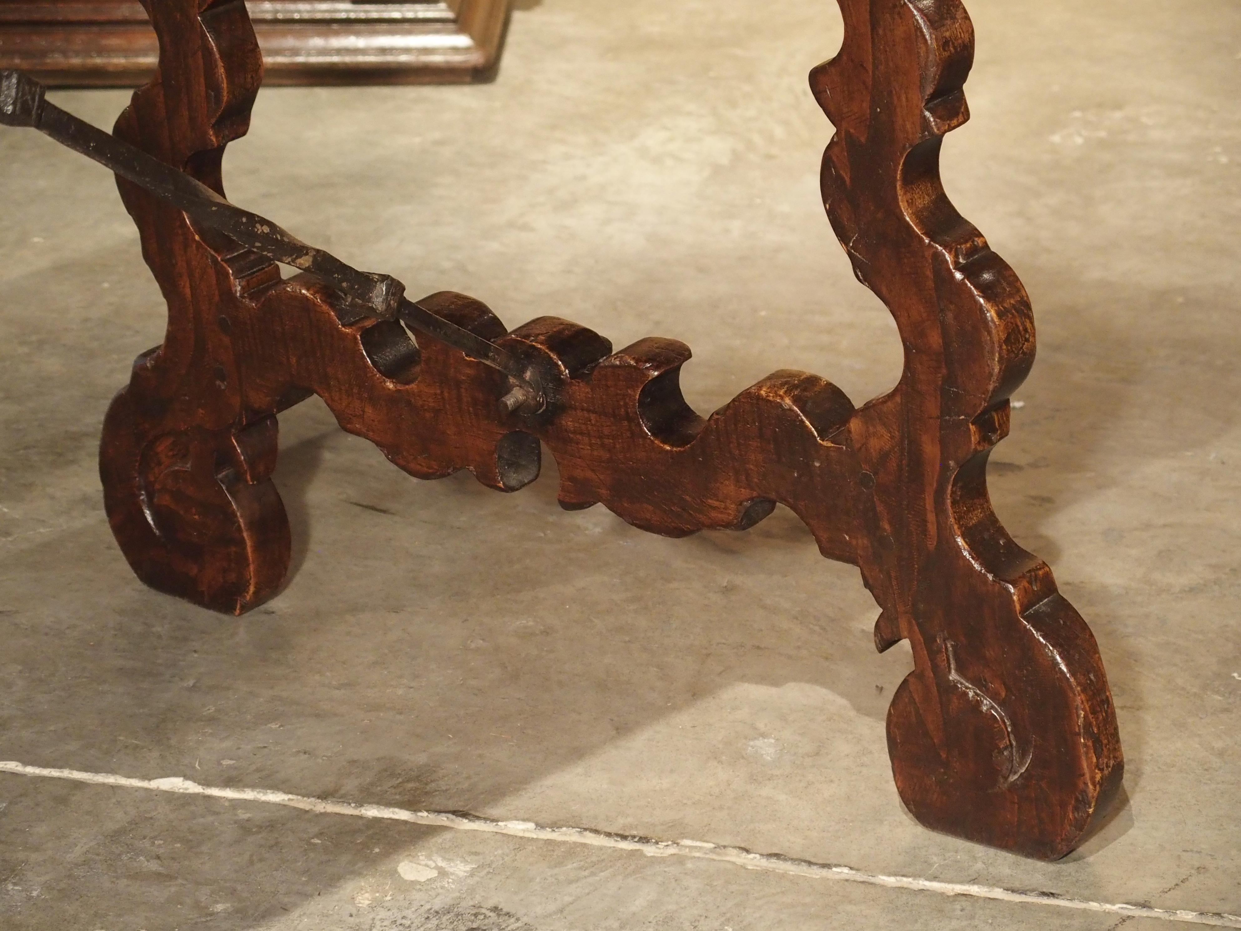 20th Century Carved Catalan Table with Lyre Legs and Wrought Iron Supports