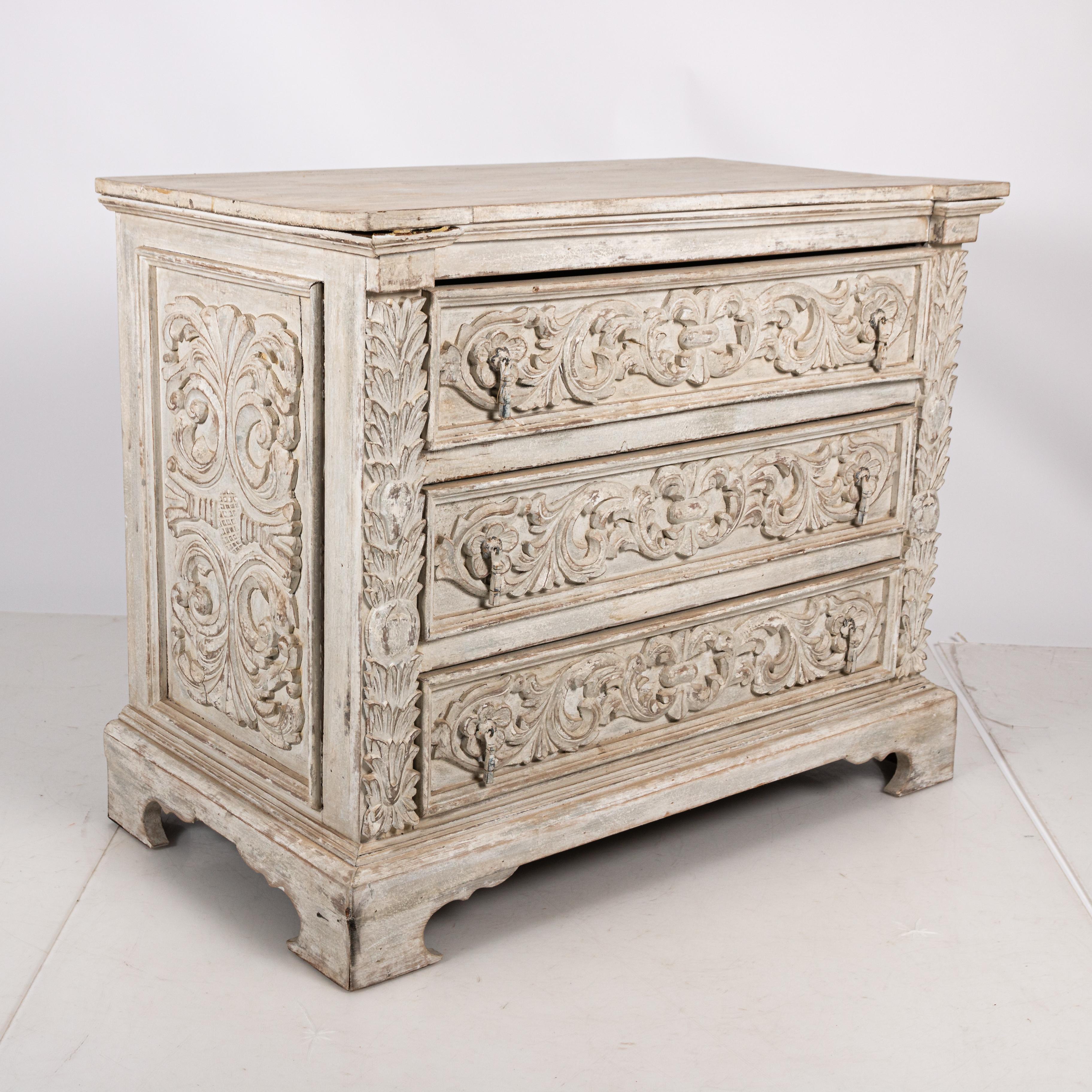 hand carved chest of drawers