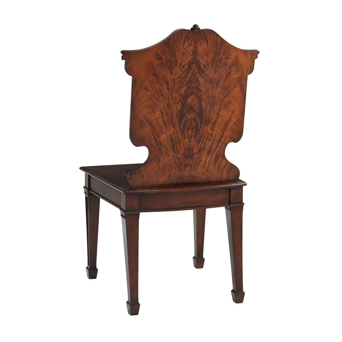A finely carved mahogany chair, the arched cartouche backrest with carved acanthus leaf details centered by the hand-painted Spencer family crest, the solid seat above a swag carved seat rail on square tapering legs.

Dimensions: 20.5