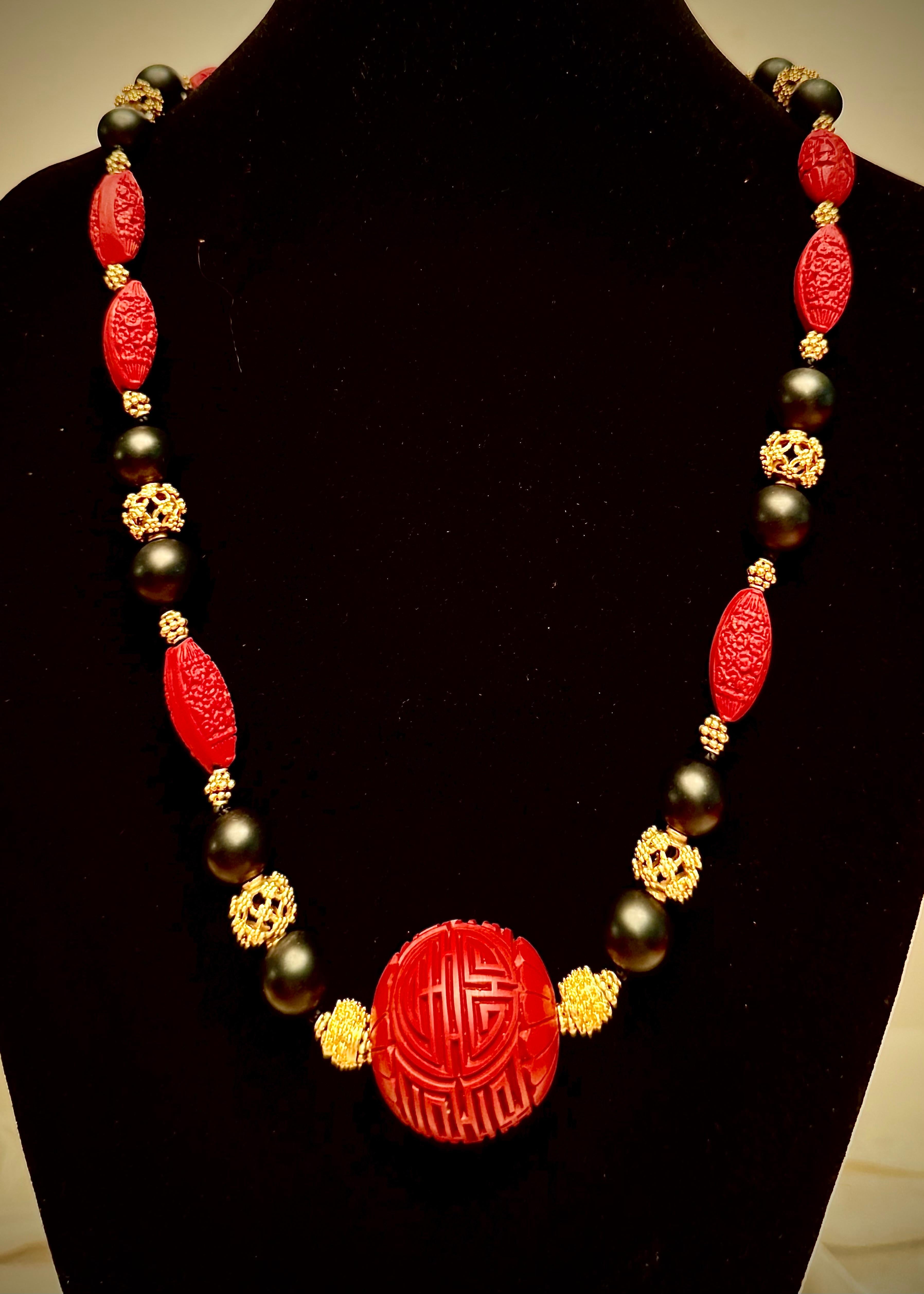 Carved cinnabar, ebonized wood and gilt sterling silver For Sale