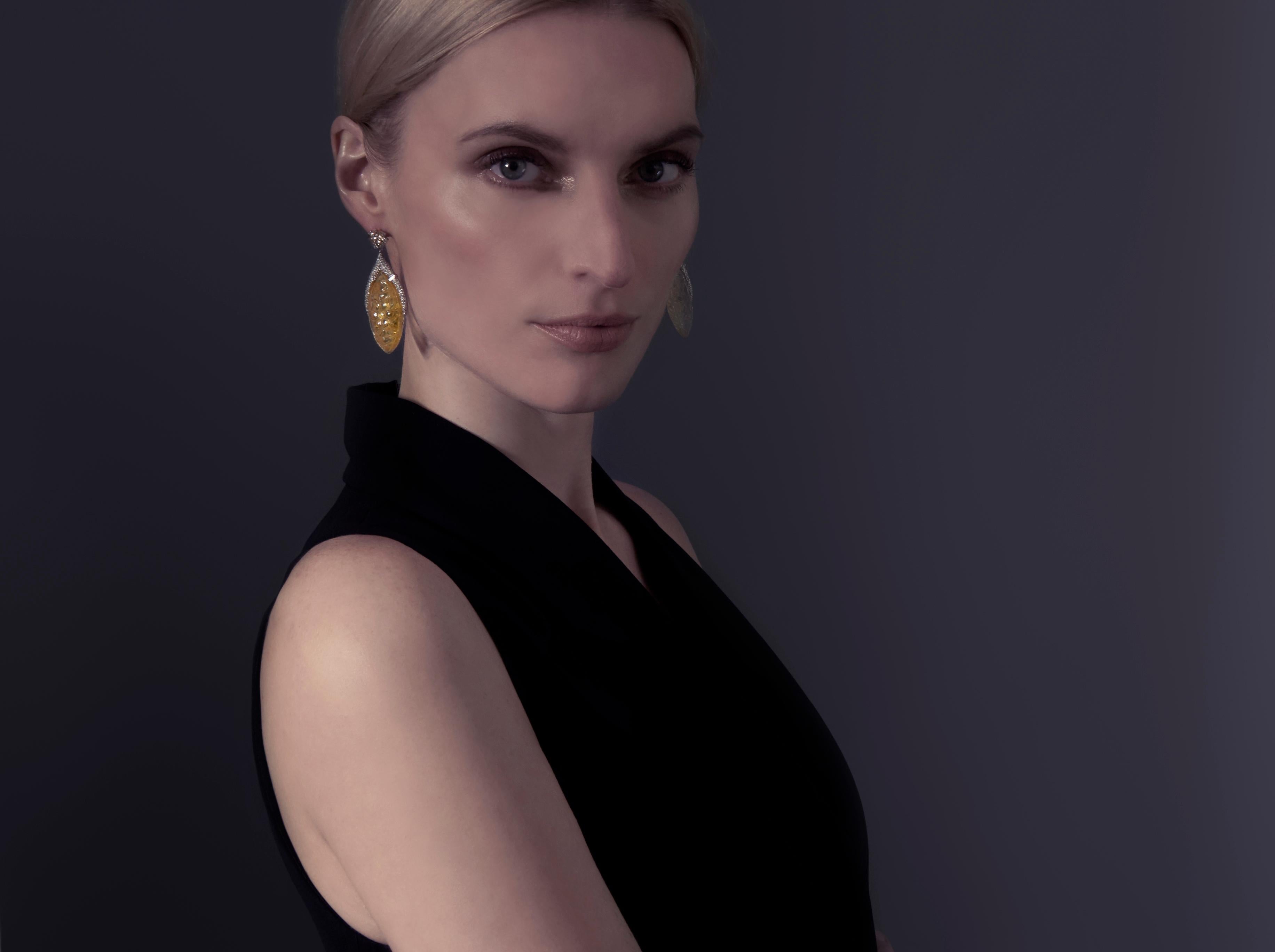 Exhibiting an attention to detail and craft, Ri Noor's Carved Citrine Earrings showcase a stunning display of gemstones that sparkle in the light. The earrings mix shapes and materials in a unique way which makes a special statement that elevates