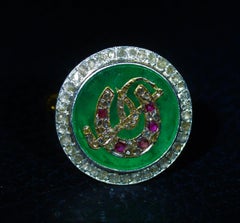 Carved Colombian Emerald Horse Motif Ring with Rose Cut Diamonds and Rubies 1821