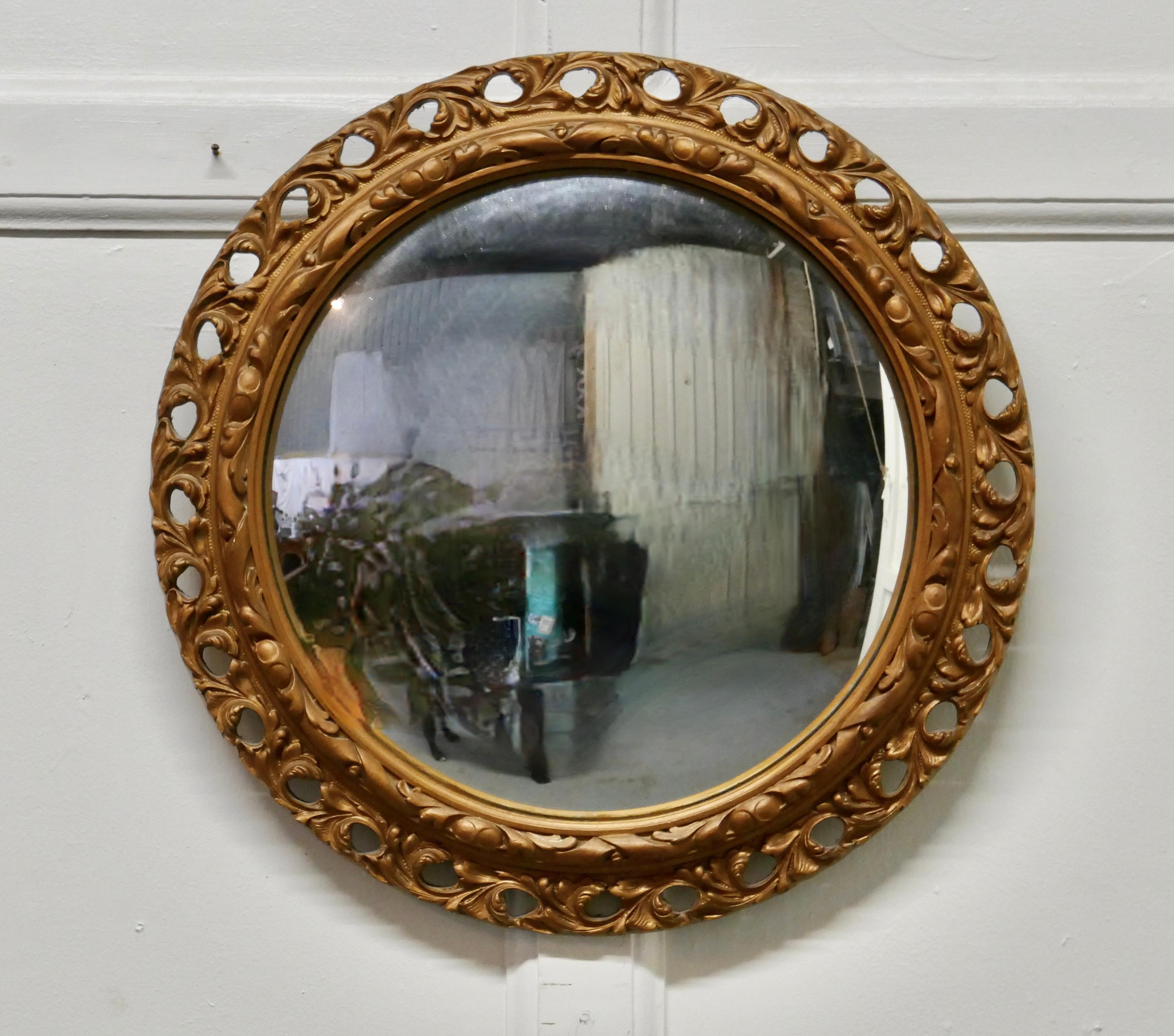 Rococo Revival Carved Convex Gilt Wall Mirror For Sale