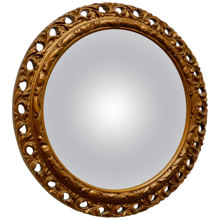 Carved Convex Gilt Wall Mirror For Sale at 1stDibs
