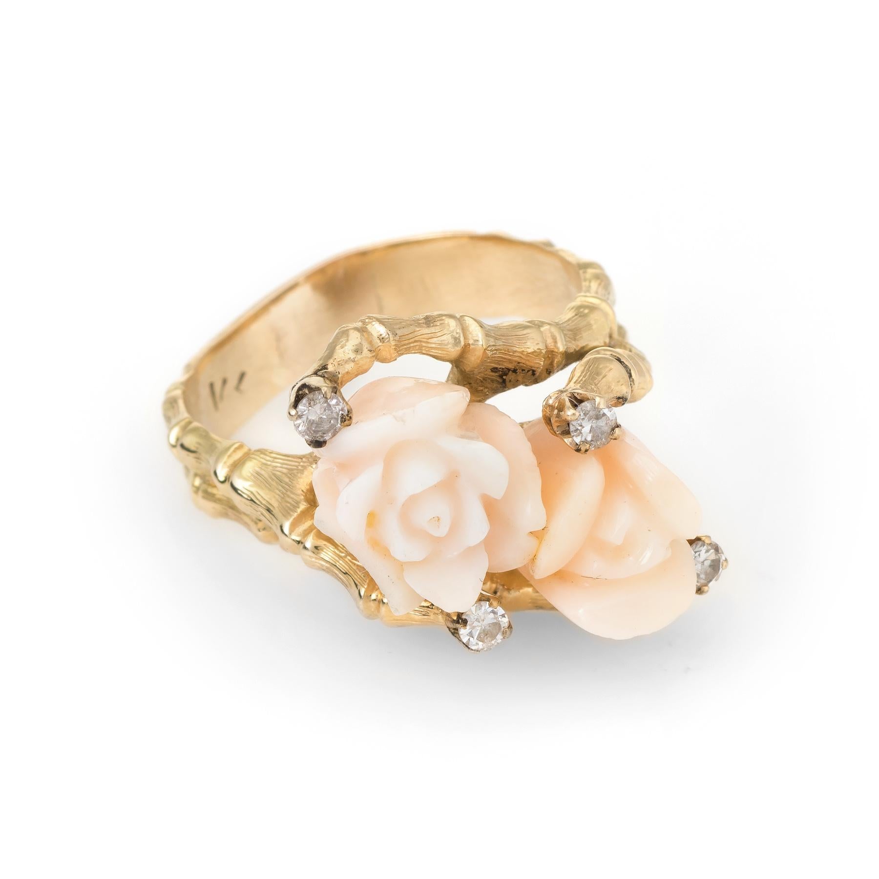 Finely detailed vintage cocktail ring (circa 1960s to 1970s), crafted in 14 karat yellow gold. 

Angel skin coral is carved in the form of a rose, measuring 8mm & 9mm, accented with an estimated 0.16 carats of diamonds (estimated at H-I color and