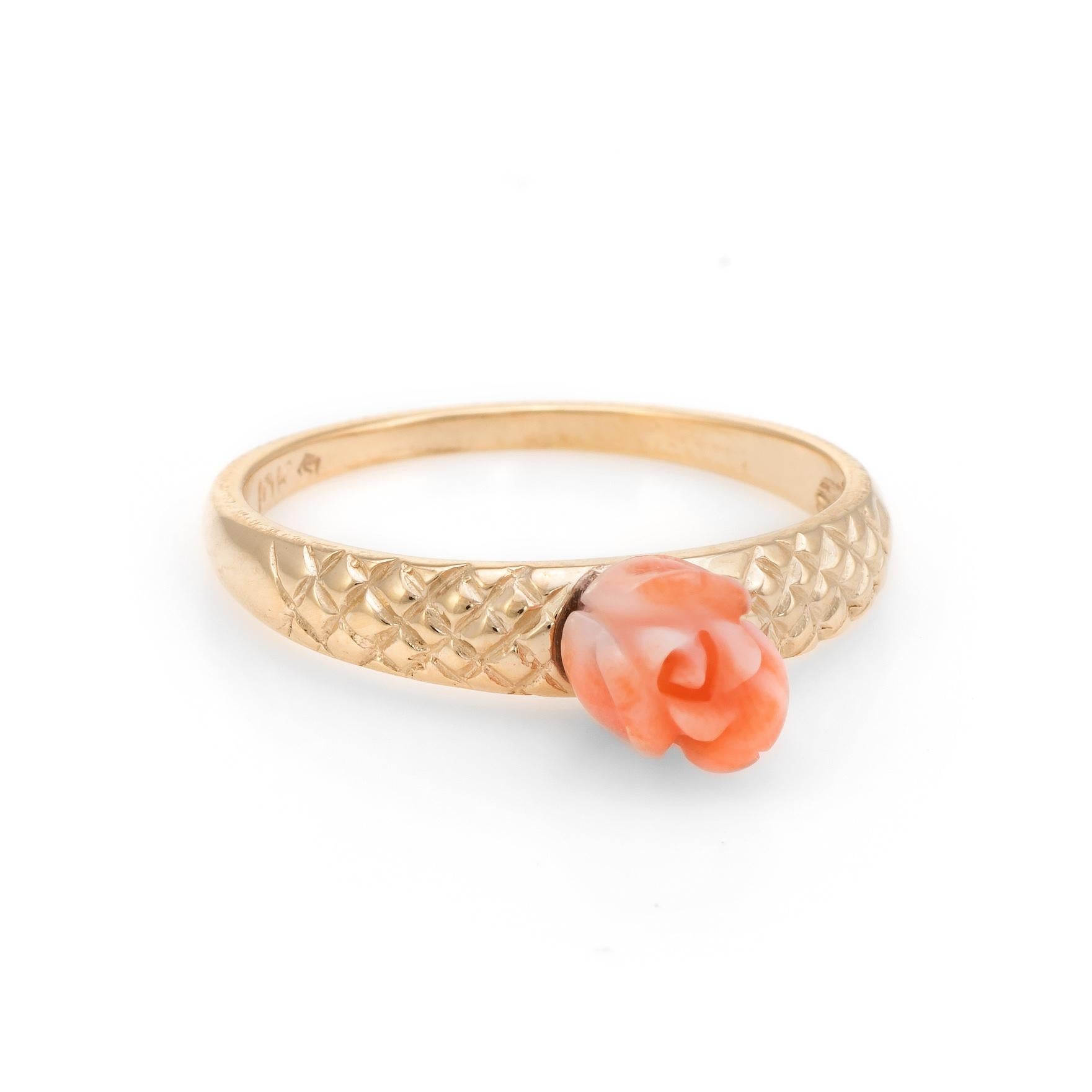 Finely detailed vintage stacking ring, crafted in 10 karat yellow gold. 

Coral is carved in the form of a rose, measuring 6.3mm. The coral is in excellent condition and free of cracks or chips.   

The ring is in excellent condition.