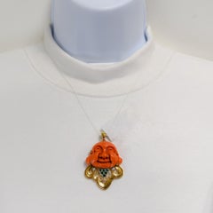 Carved Coral Smiling Buddha Pendant in 18K Two Tone Gold