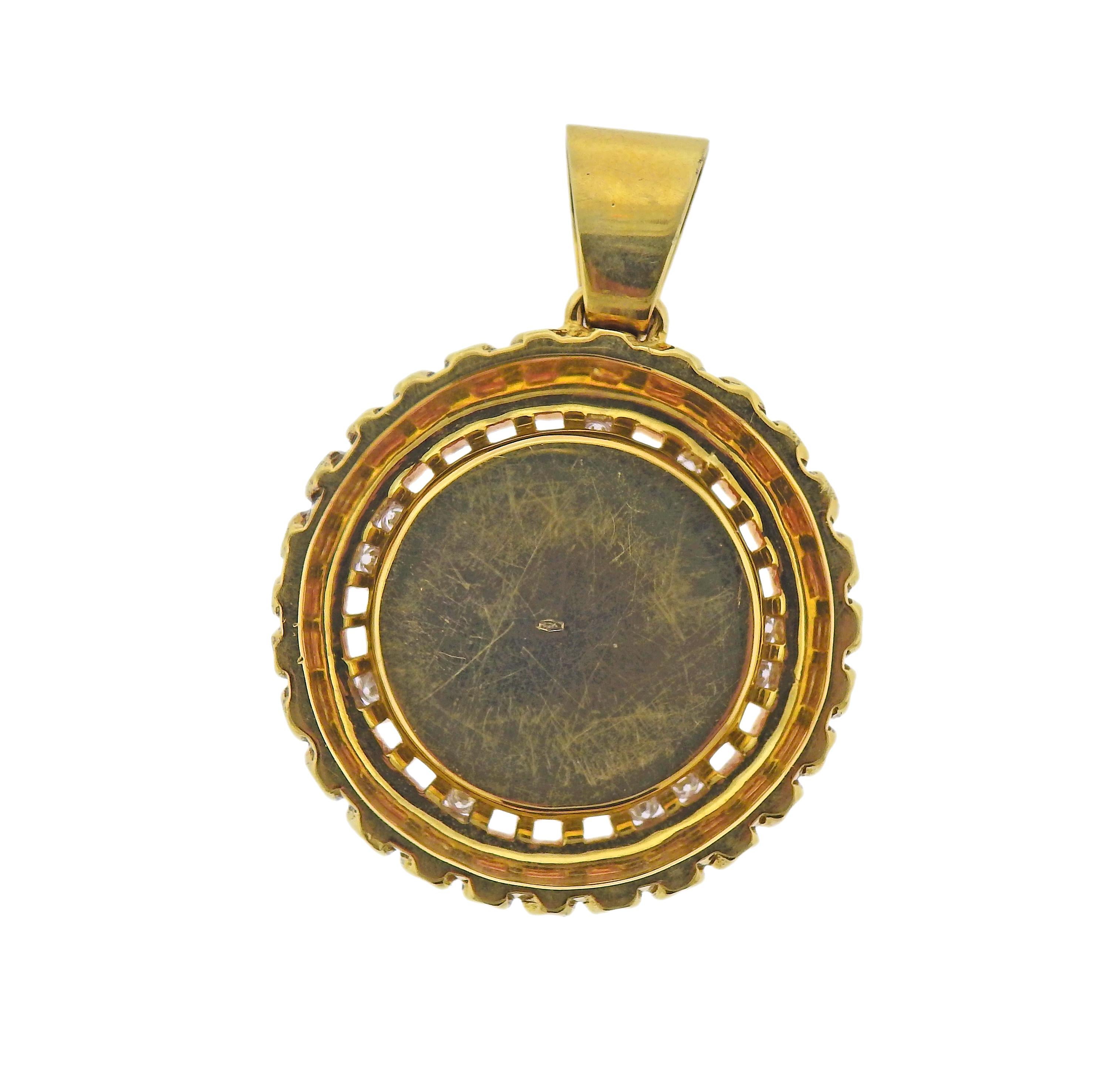 18k gold pendant with carved coral Sun, surrounded with approx. 0.30ctw in diamonds. Pendant is 35mm in diameter and 50mm long with bale. Marked 750. Weight - 28.3 grams.