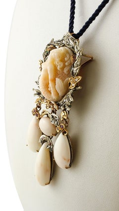 Carved Coral Diamonds Rubies Emeralds Sapphires Gold and Silver Pendant/Brooch