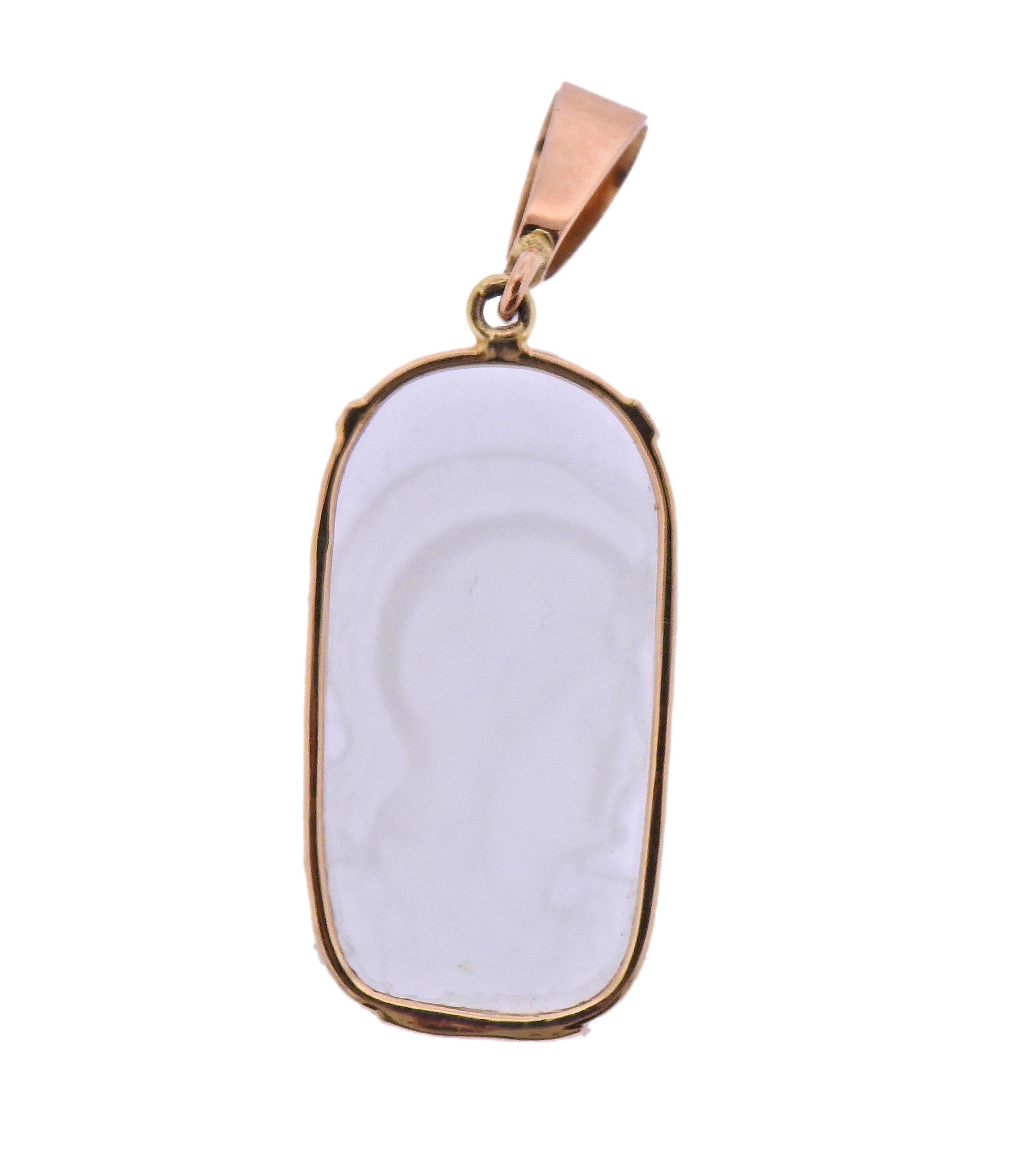 14k gold pendant, featuring carved crystal cameo, depicting a Roman soldier profile. Pendant measures 2