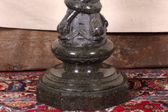 Carved Dark Marble Column with Dolphins