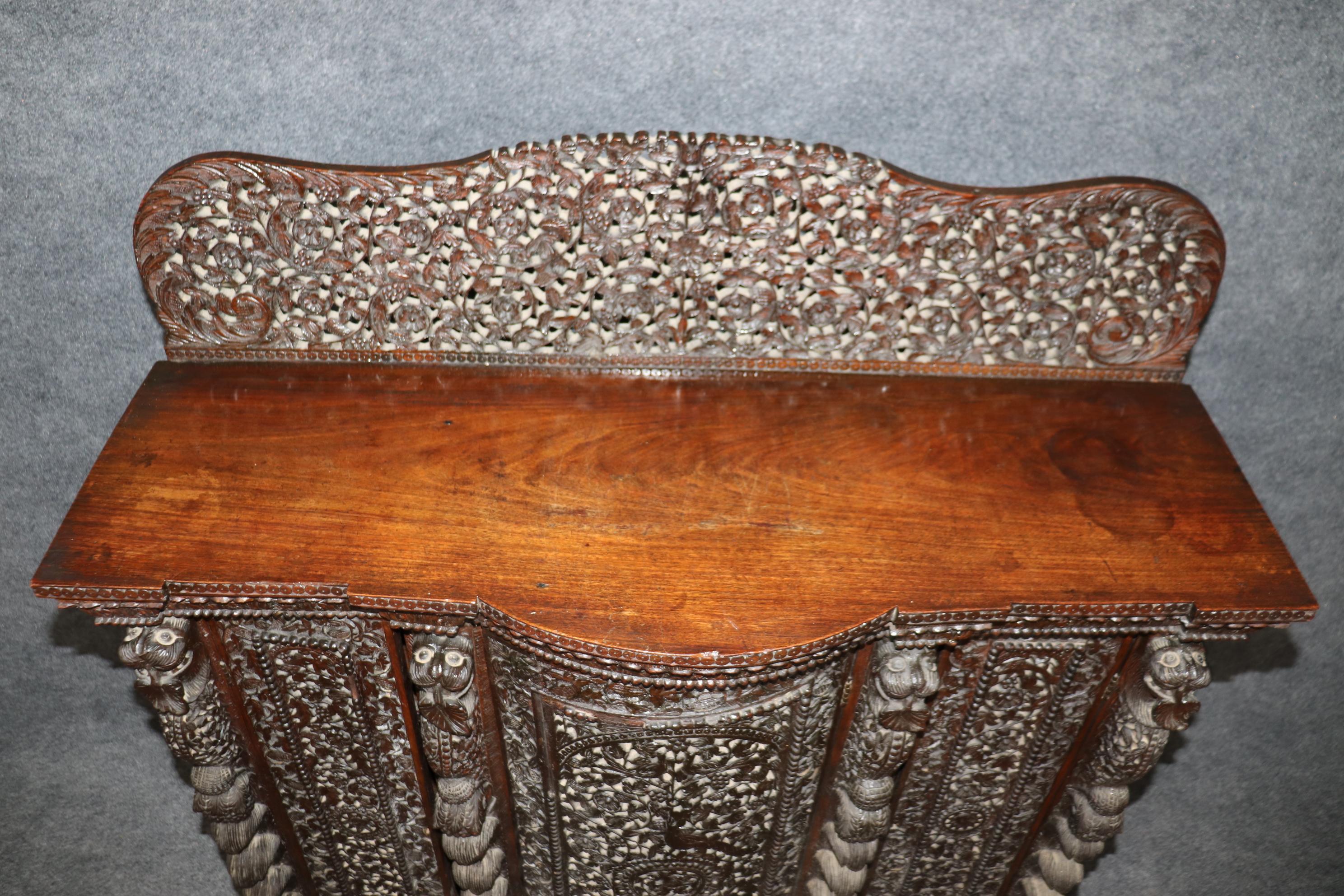 Late 19th Century Carved Dark Teak Anglo-Indian Dog and Paw Footed Commode Buffet Cabinet