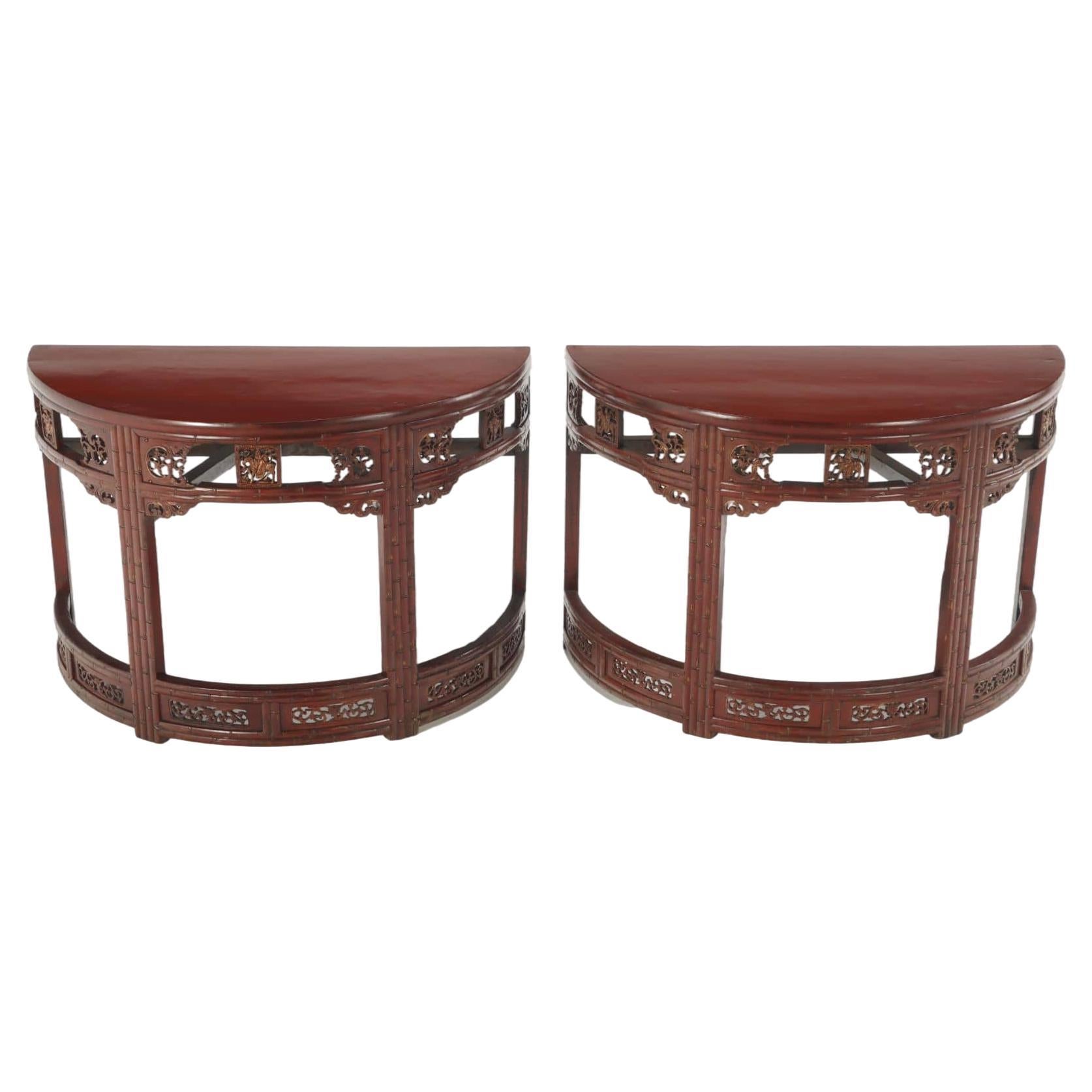 Carved demi-lune Chinese console tables in red C 1880. For Sale