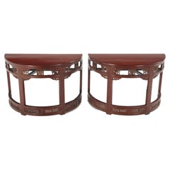 Antique Carved demi-lune Chinese console tables in red C 1880.