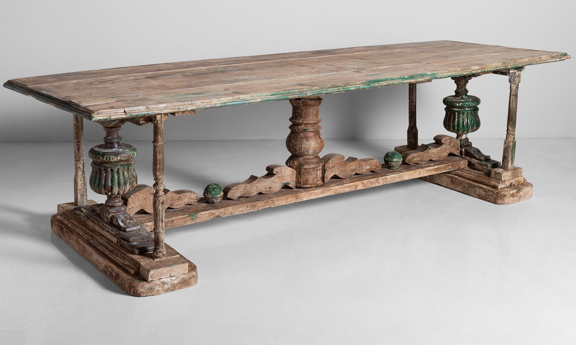 Carved dining table, Italy, 18th century.

Heavily patinated rustic form with traces of original paint and wonderful decorative carved details on base.