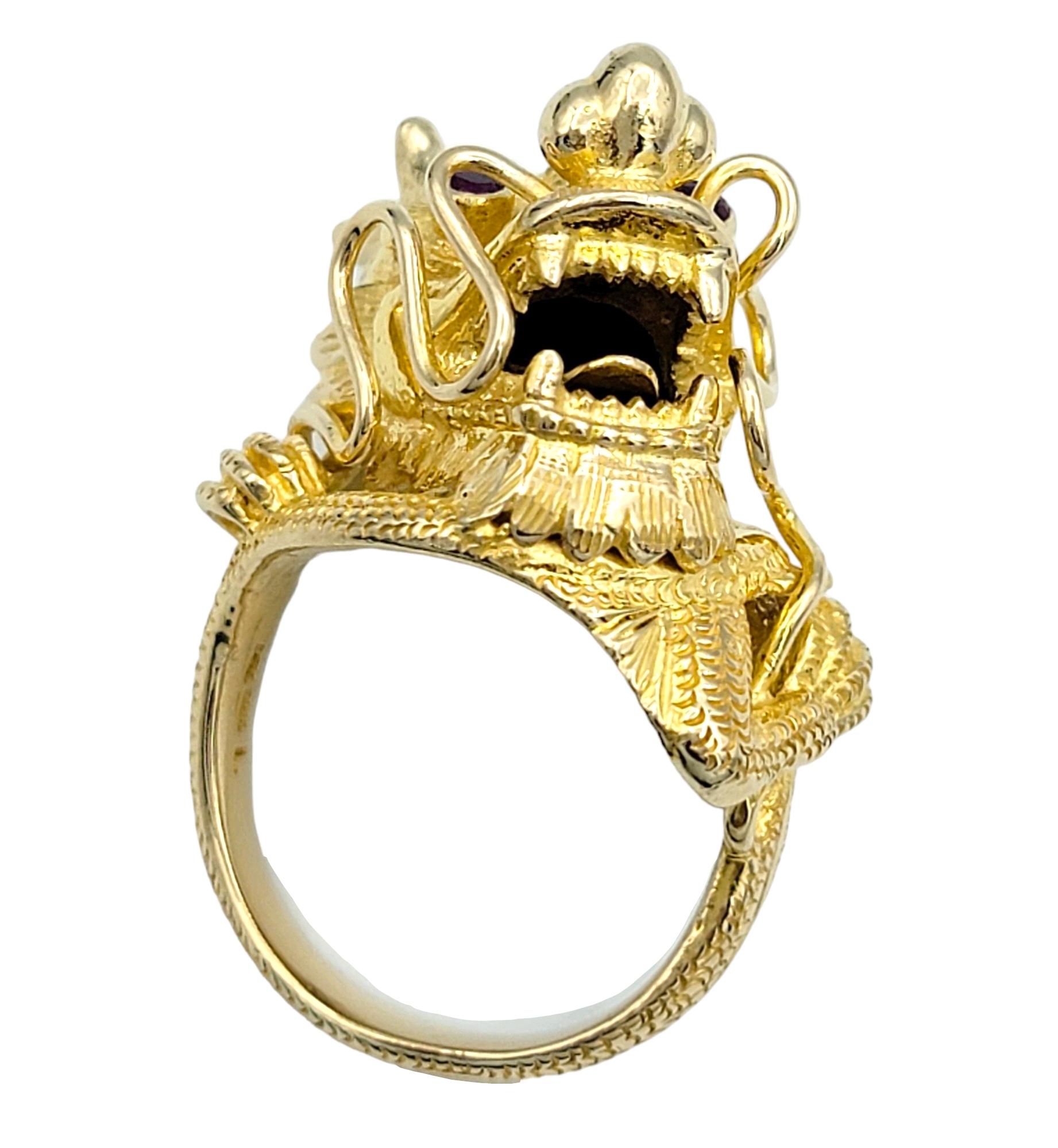 Carved Dragon Head Cocktail Ring with Red Ruby Eyes Set in 14 Karat Yellow Gold In Good Condition For Sale In Scottsdale, AZ