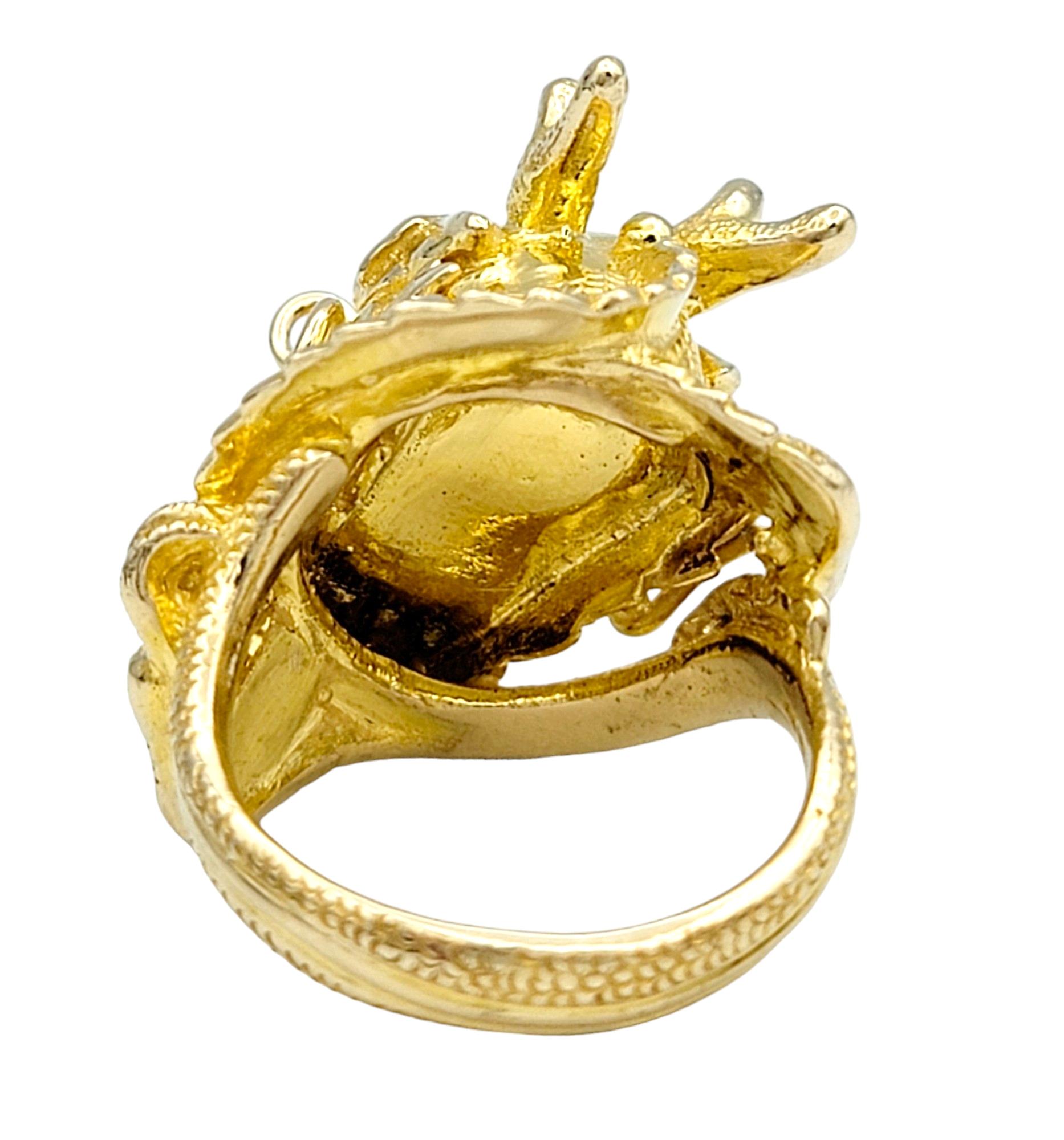 Carved Dragon Head Cocktail Ring with Red Ruby Eyes Set in 14 Karat Yellow Gold For Sale 1