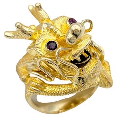 Carved Dragon Head Cocktail Ring with Red Ruby Eyes Set in 14 Karat Yellow Gold