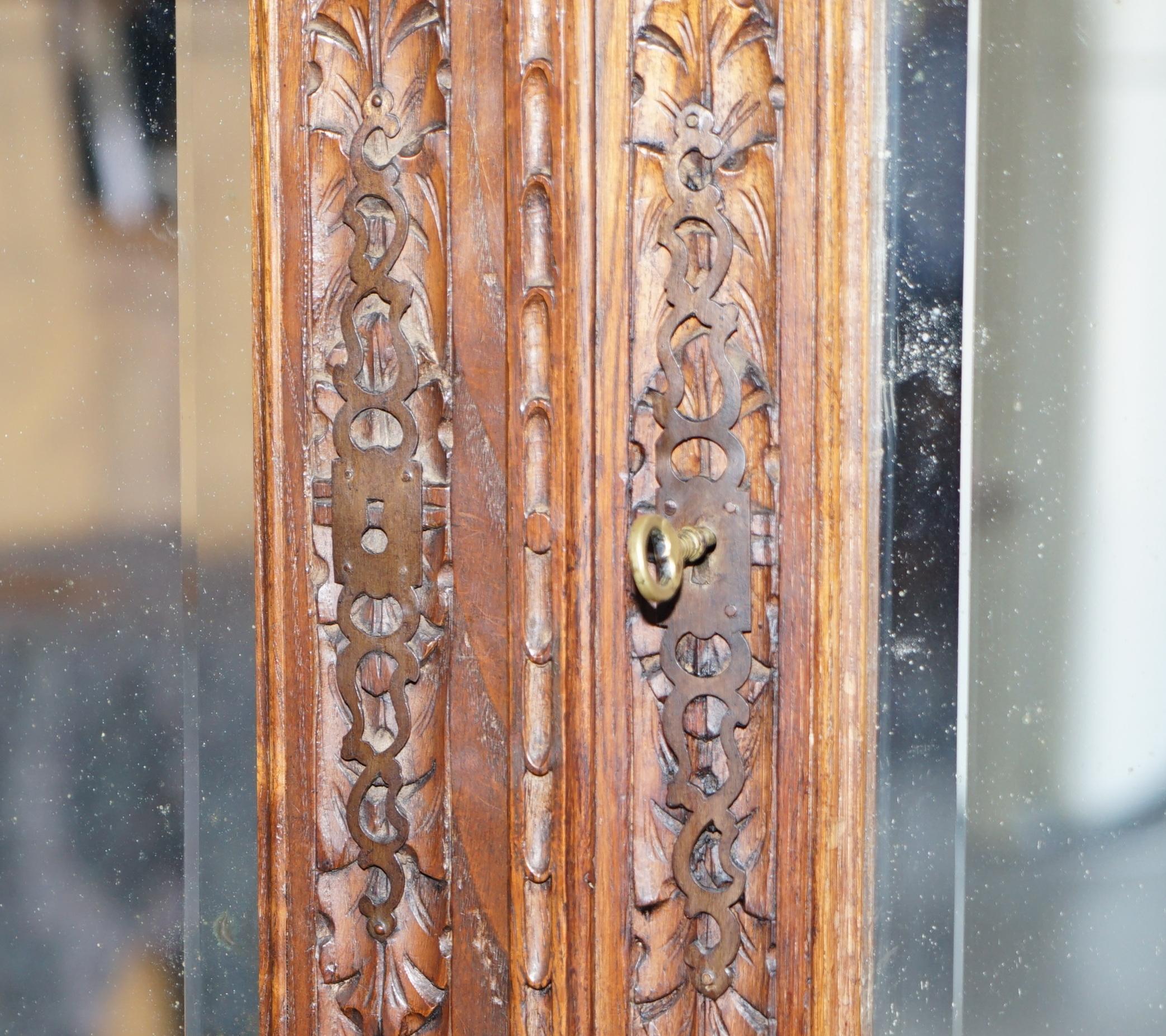 Late 19th Century Carved Dutch Antique circa 1880 Armoire Folded Lined Wardrobe Mirrored Doors For Sale