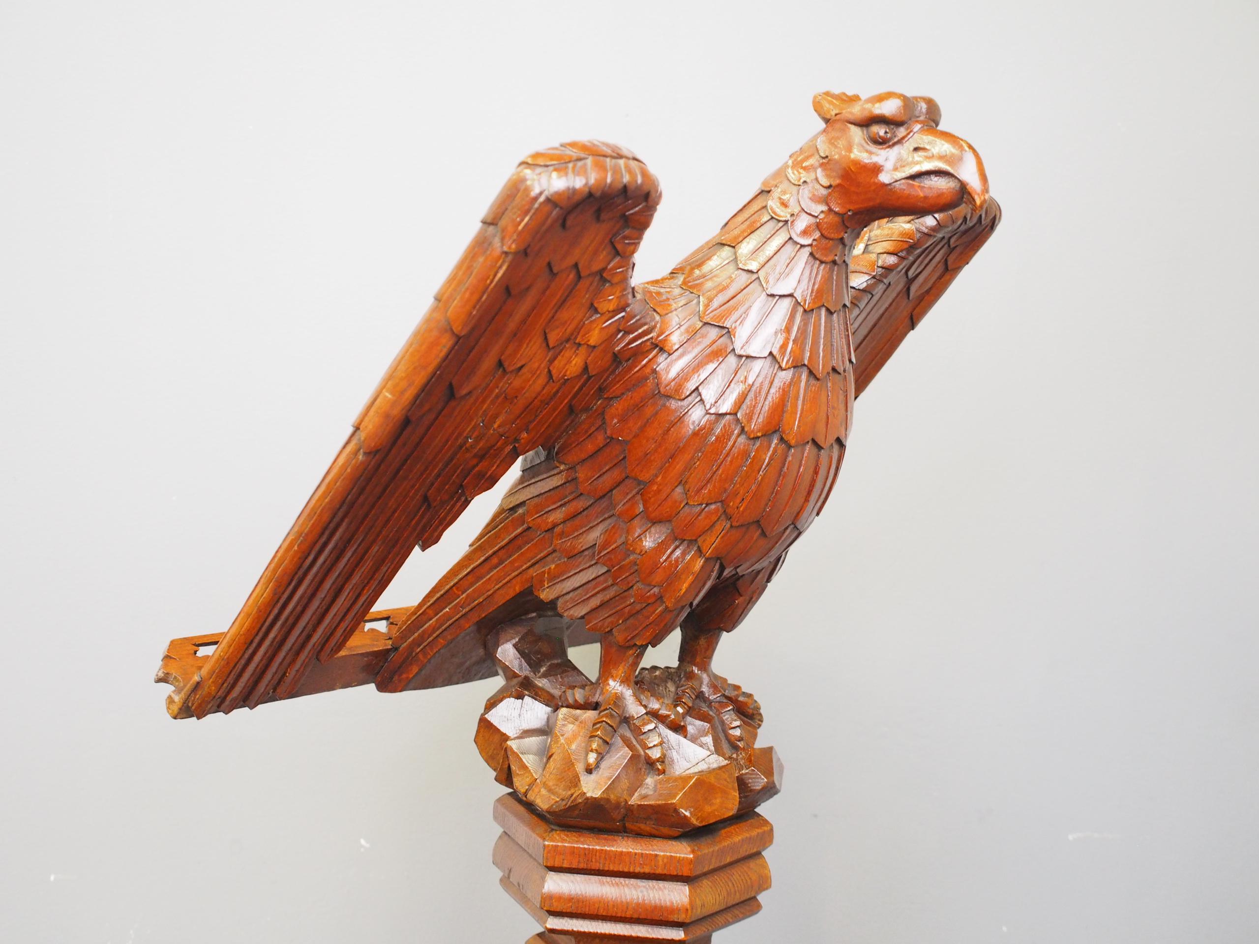 Carved eagle lectern, with stamp of ‘Lamb’, circa 1860. The carved eagle stands on a carved rock design, and the back of the wings has a small open fretwork bracket for holding papers. Standing on a faceted column, with bezels towards the base which