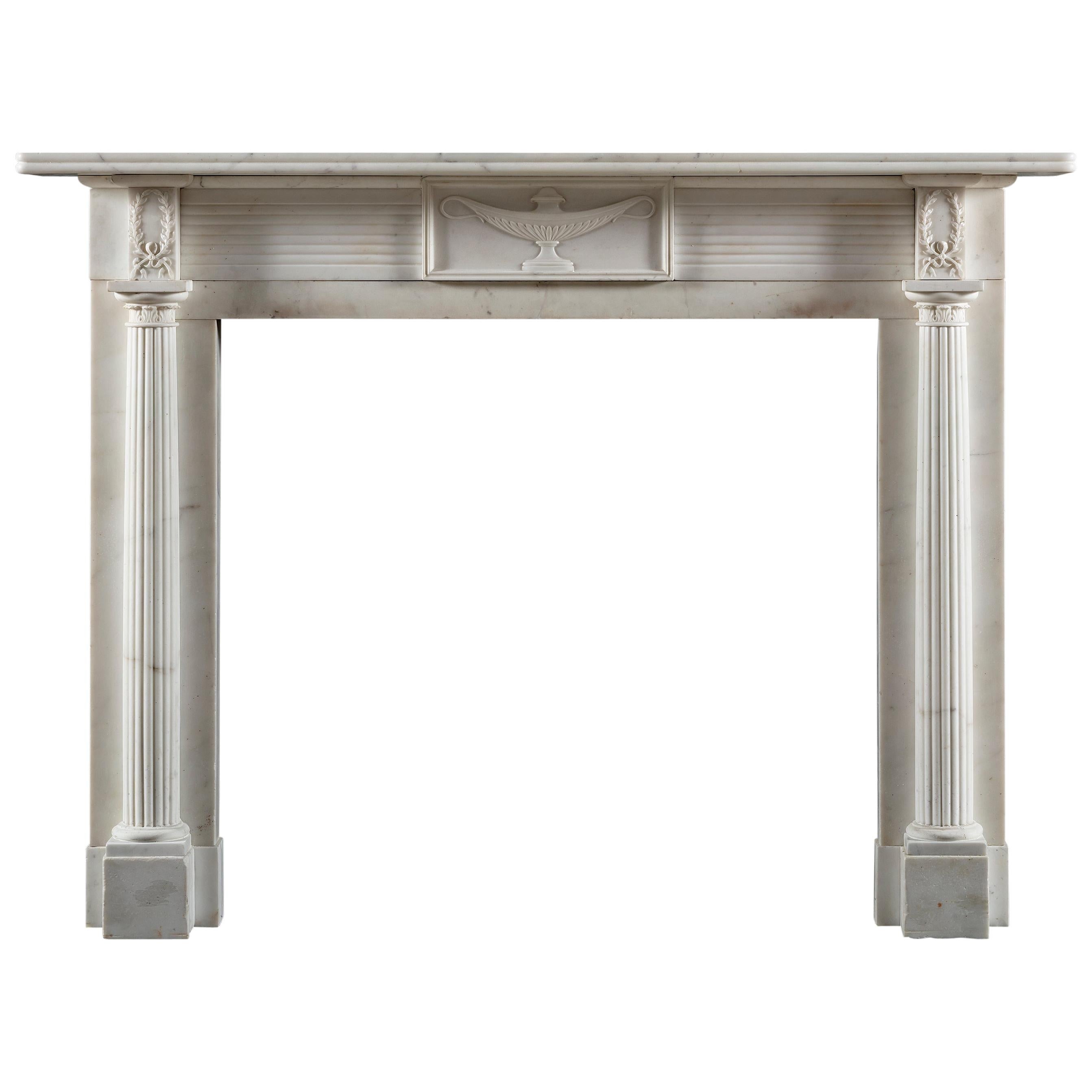 Carved Early 19th Century Regency Period Chimneypiece in Statuary White Marble