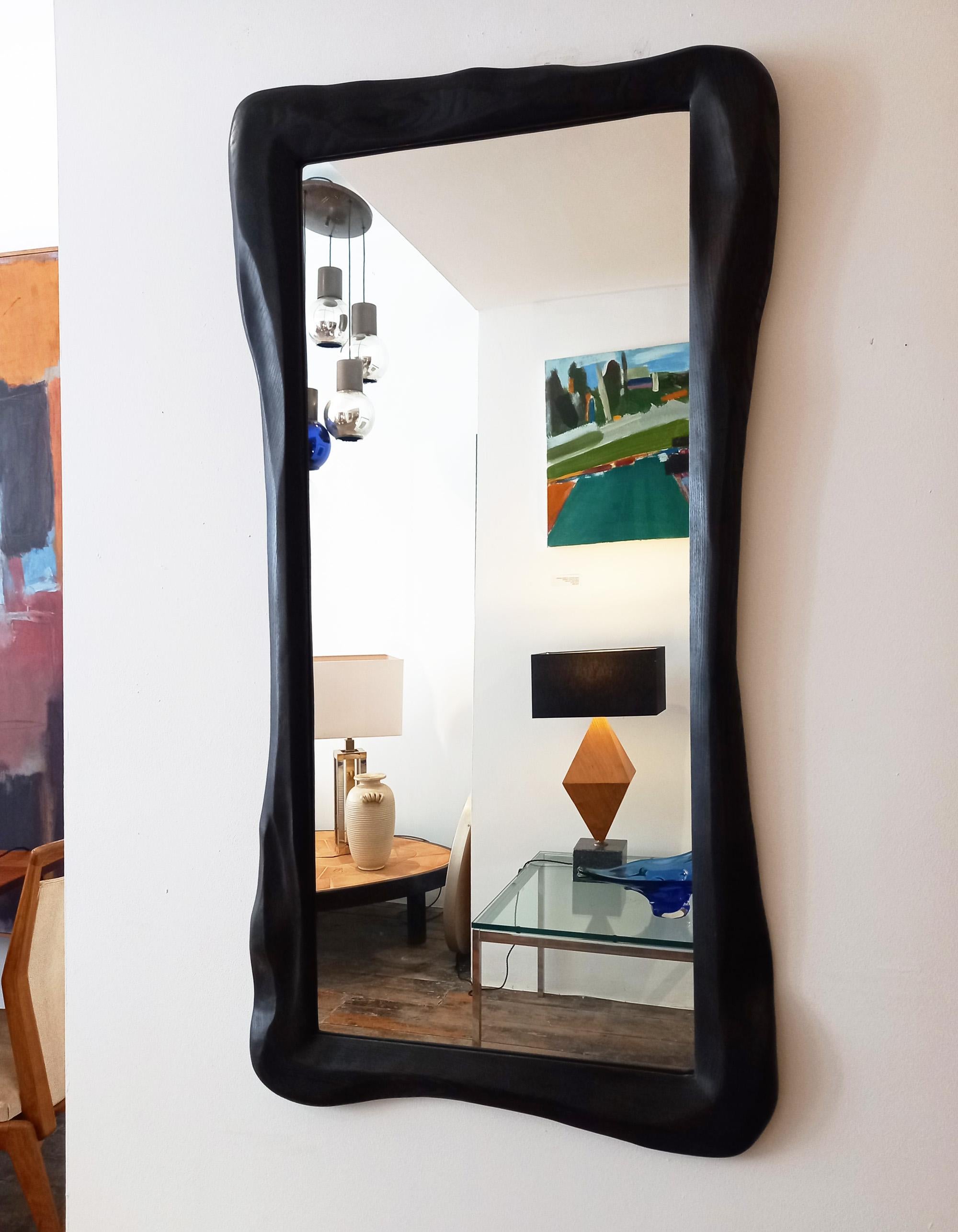 Carved ebonized ash wooden Mirror by John Alfredo Harris In New Condition In Saint Leonards-on-sea, England