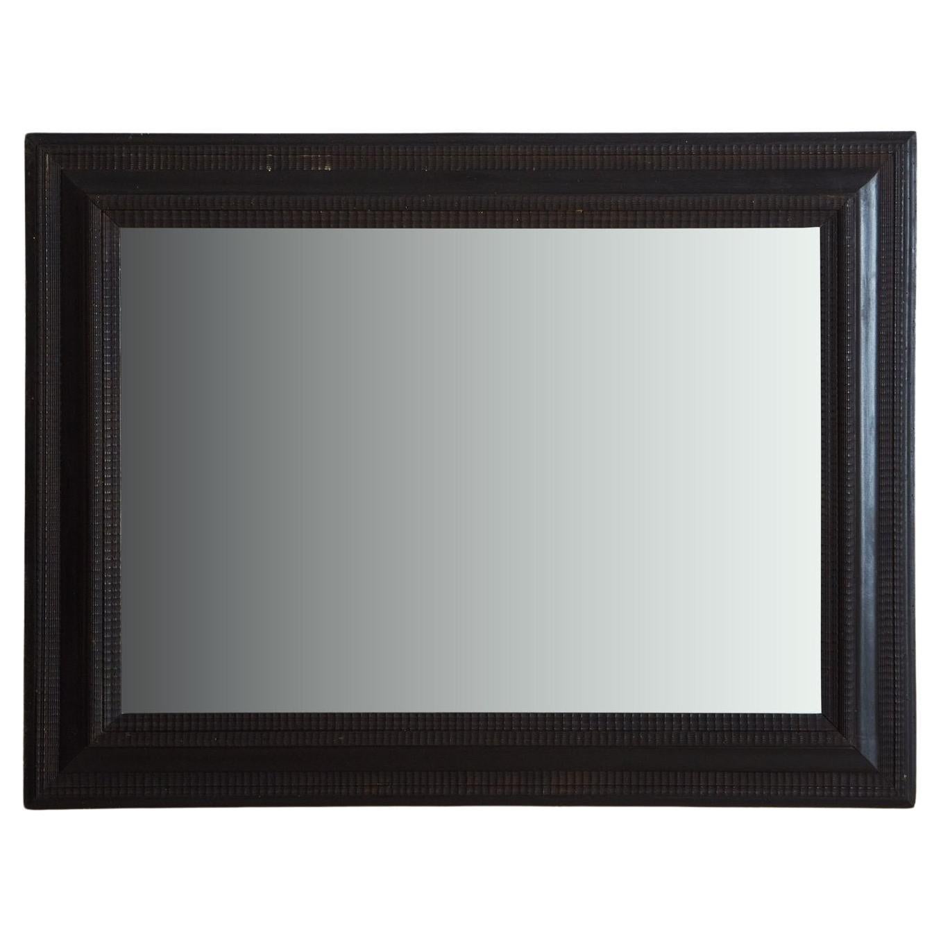 Carved Ebonized Wood Frame Mirror, France 20th Century For Sale