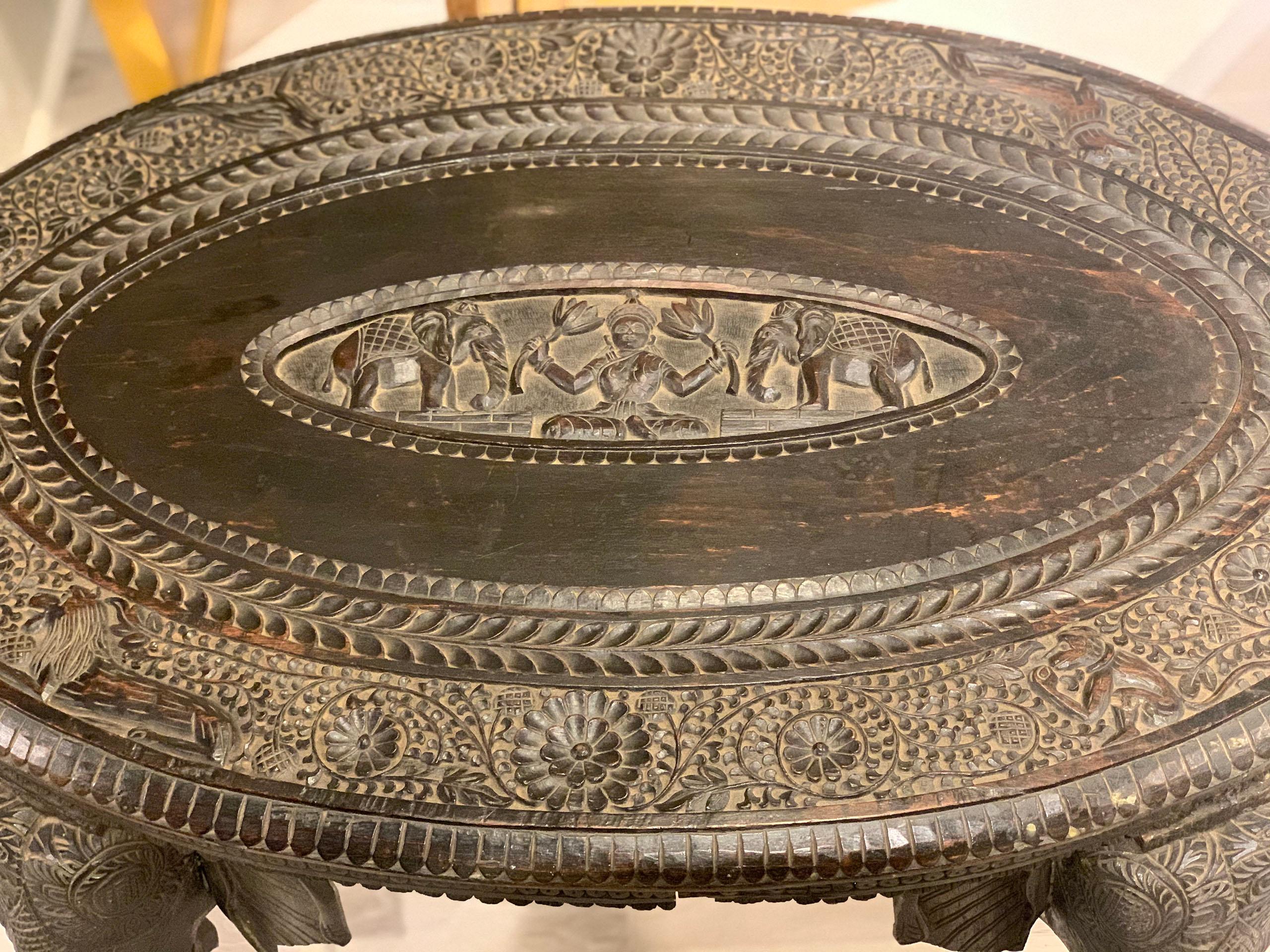 Hand-Carved Carved Ebony Center Tabler For Sale