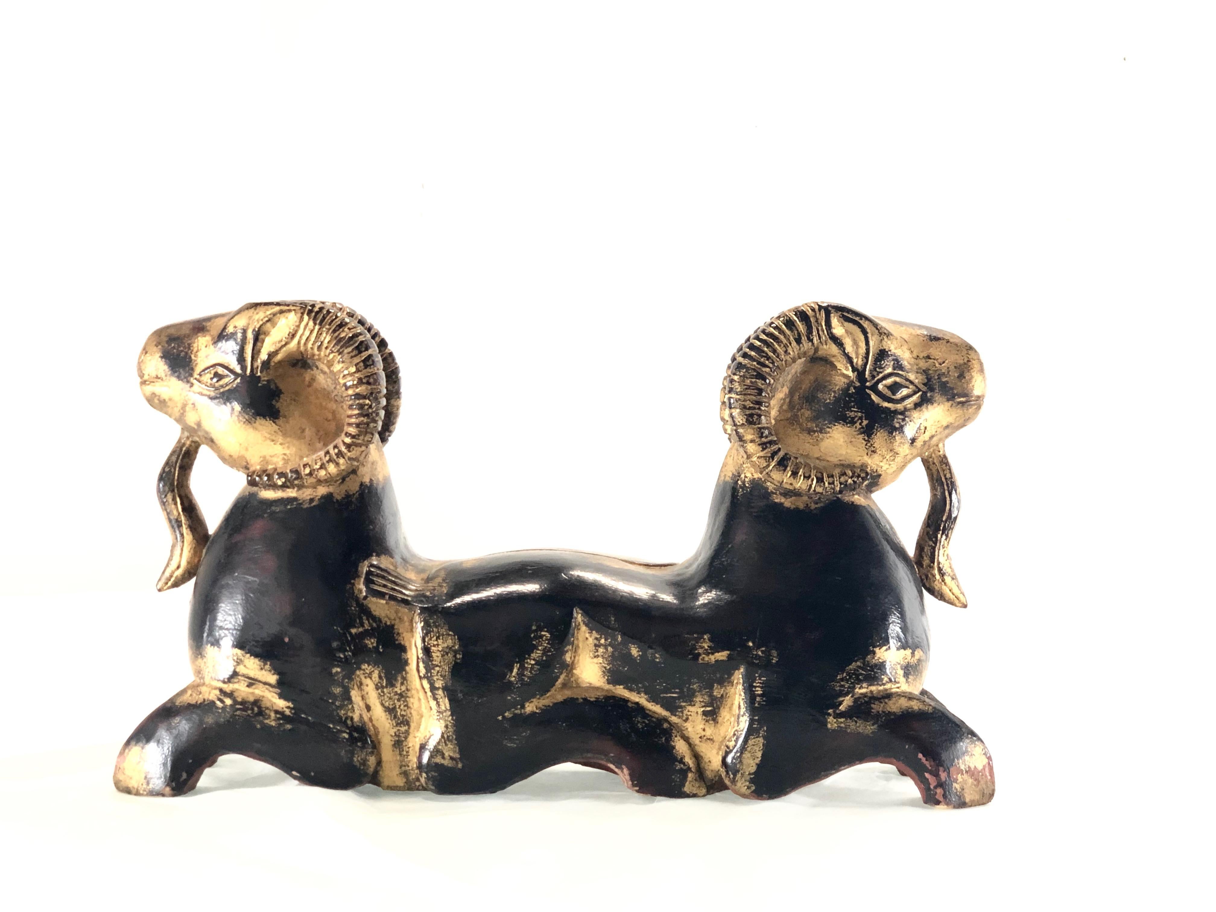 Carved Egyptian two headed ram. Wood carving is in good vintage condition,
Dimensions:
23 W x 5 D x 13 T.