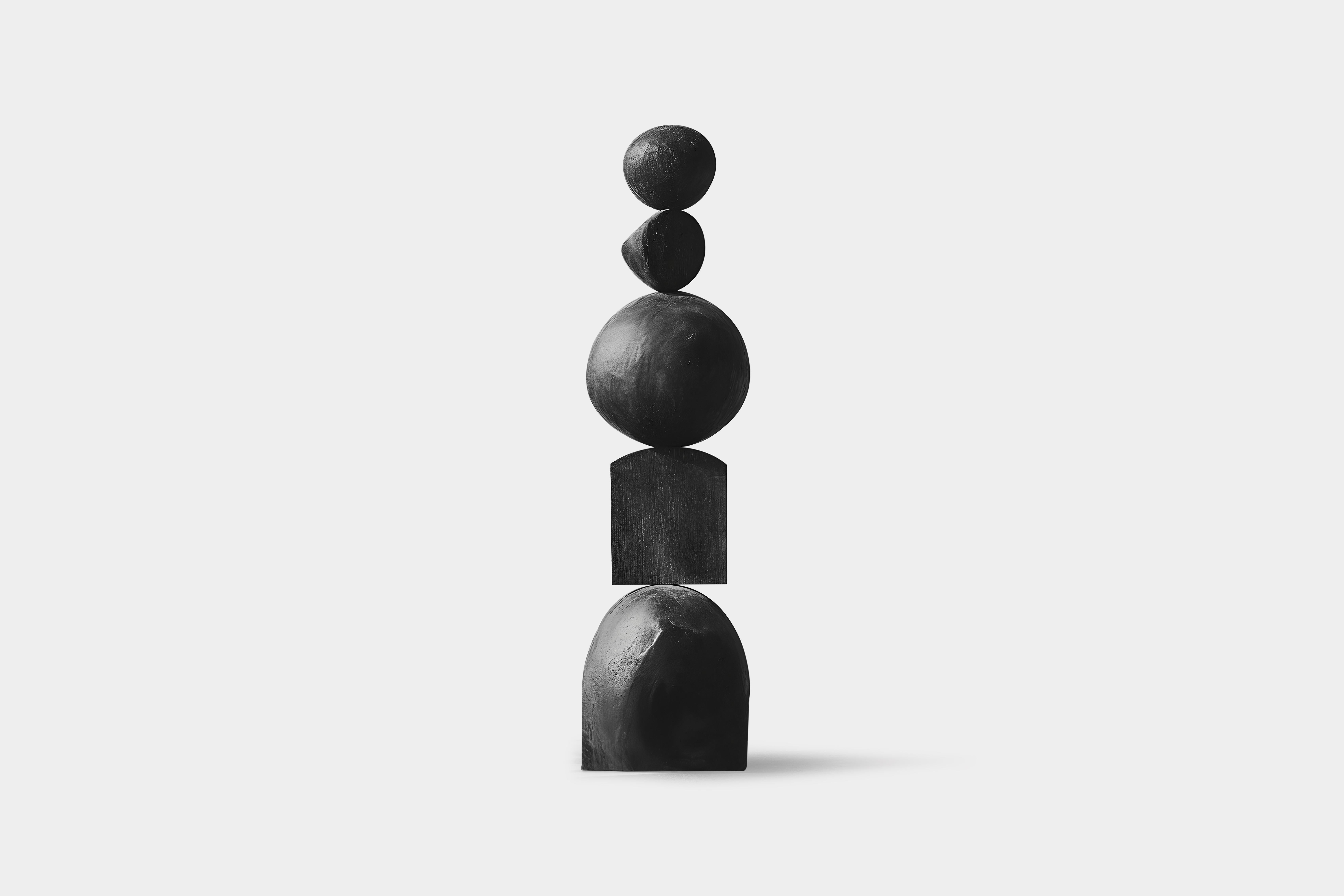 Carved Elegance, Black Solid Wood Still Stand No80 by NONO
——


Joel Escalona's wooden standing sculptures are objects of raw beauty and serene grace. Each one is a testament to the power of the material, with smooth curves that flow into one
