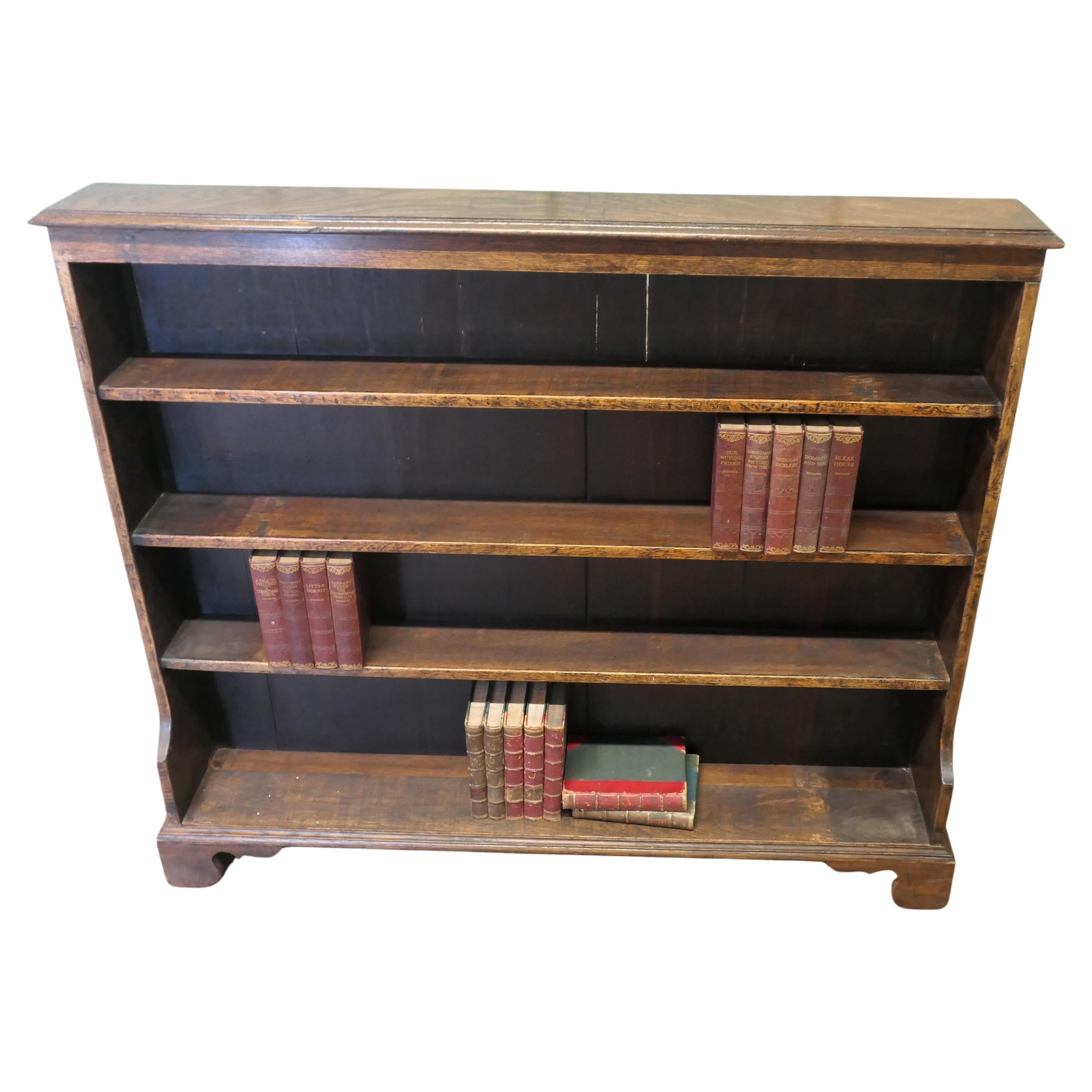 Carved Elm Open Bookcase.  The bookcase is good quality, with attractive carving