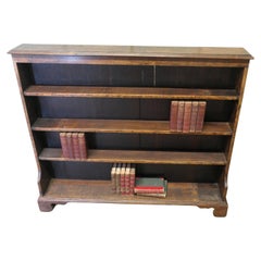 Carved Elm Open Bookcase.  The bookcase is good quality, with attractive carving