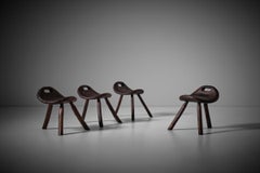 Carved Elm Wooden Saddle Stools, France, 1950s