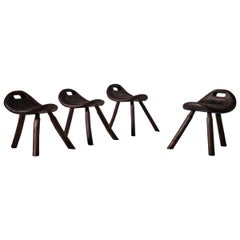Carved Elm Wooden Saddle Stools, France, 1950s